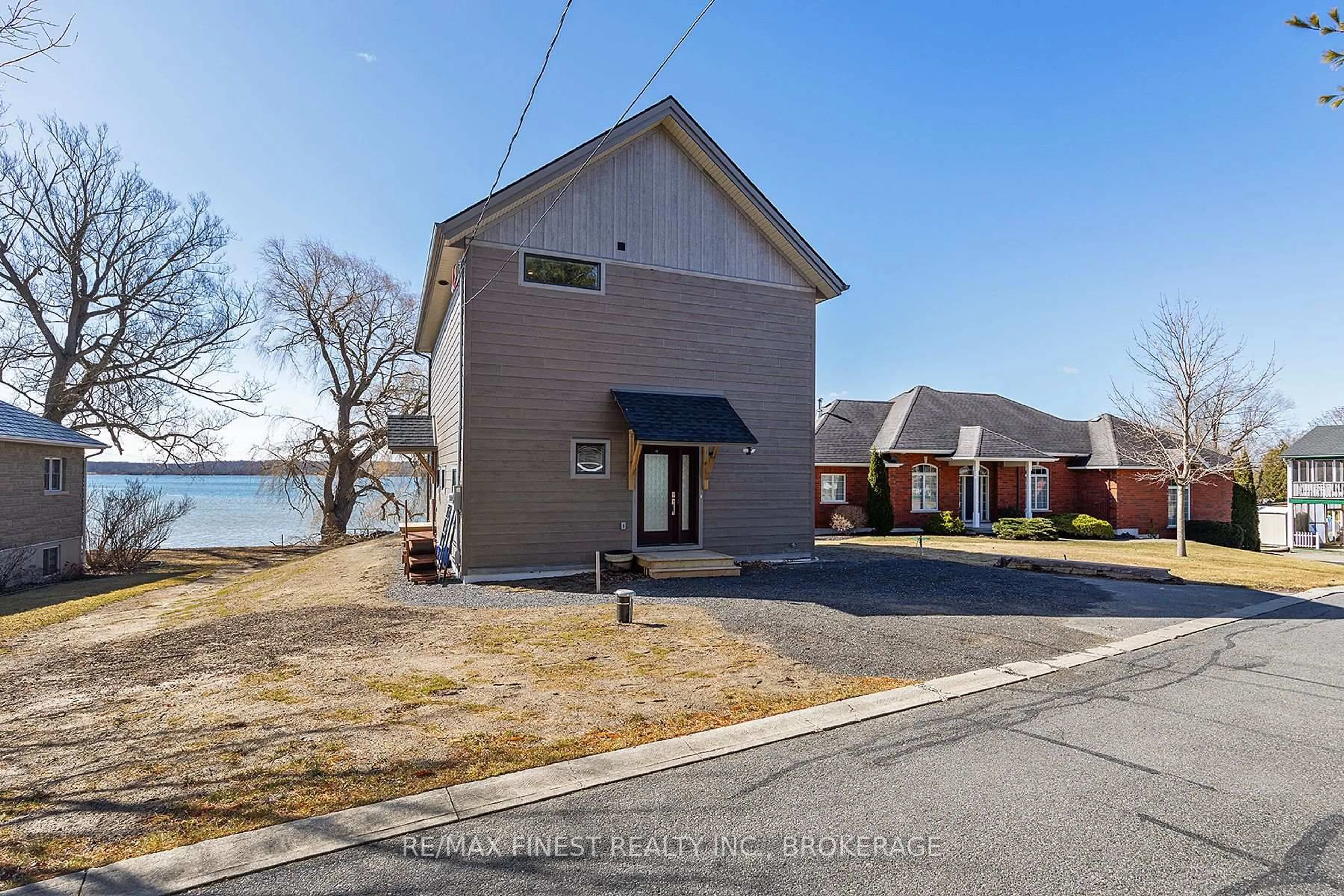 A pic from outside/outdoor area/front of a property/back of a property/a pic from drone, water/lake/river/ocean view for 113 Willowbank Rd, Gananoque Ontario K7G 2V5