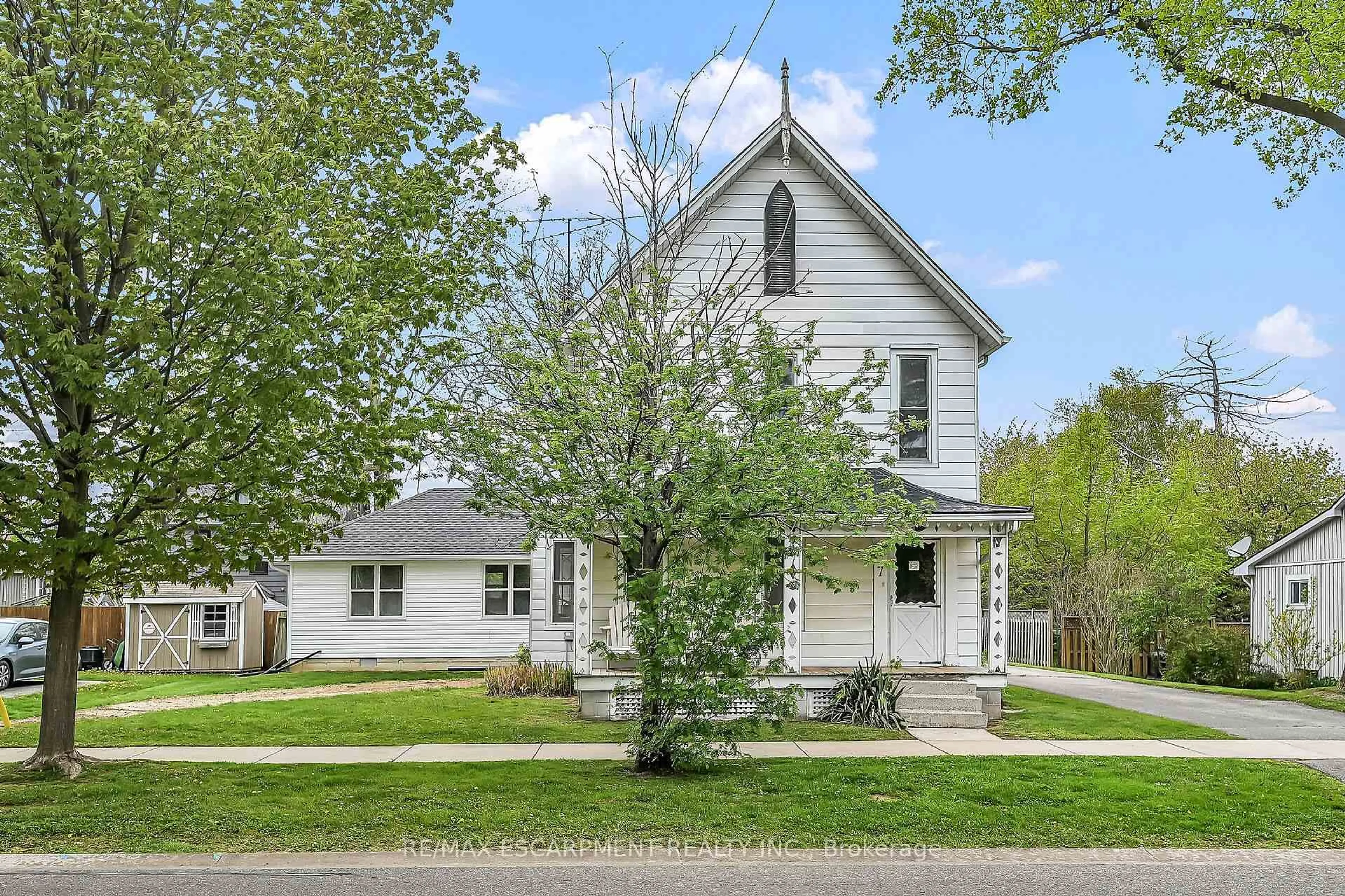 Home with vinyl exterior material, street for 7 Greenrock St, Norfolk Ontario N0A 1N0