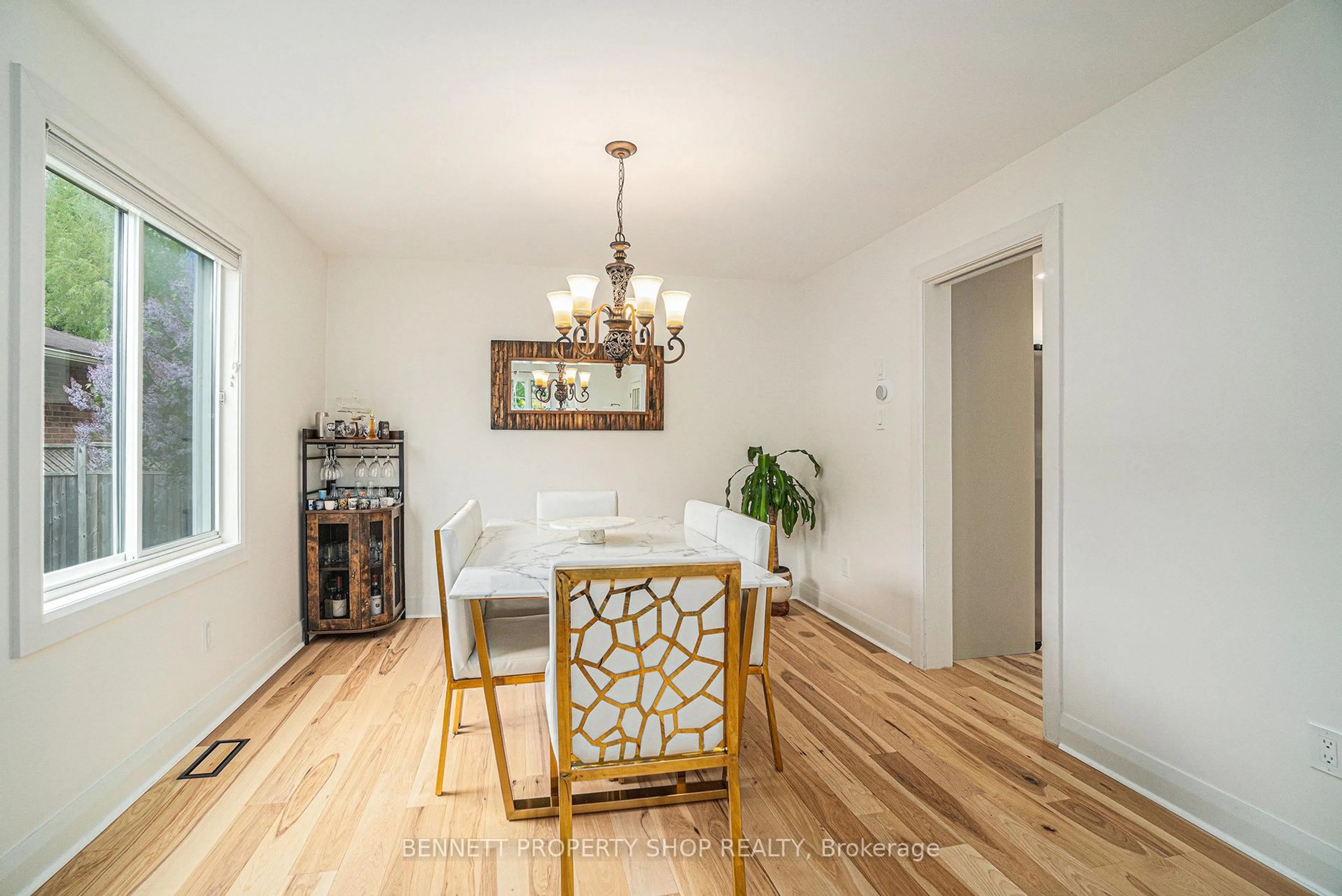 Dining room, wood/laminate floor for 23 Springwood Circ, Ottawa Ontario K2S 1W2