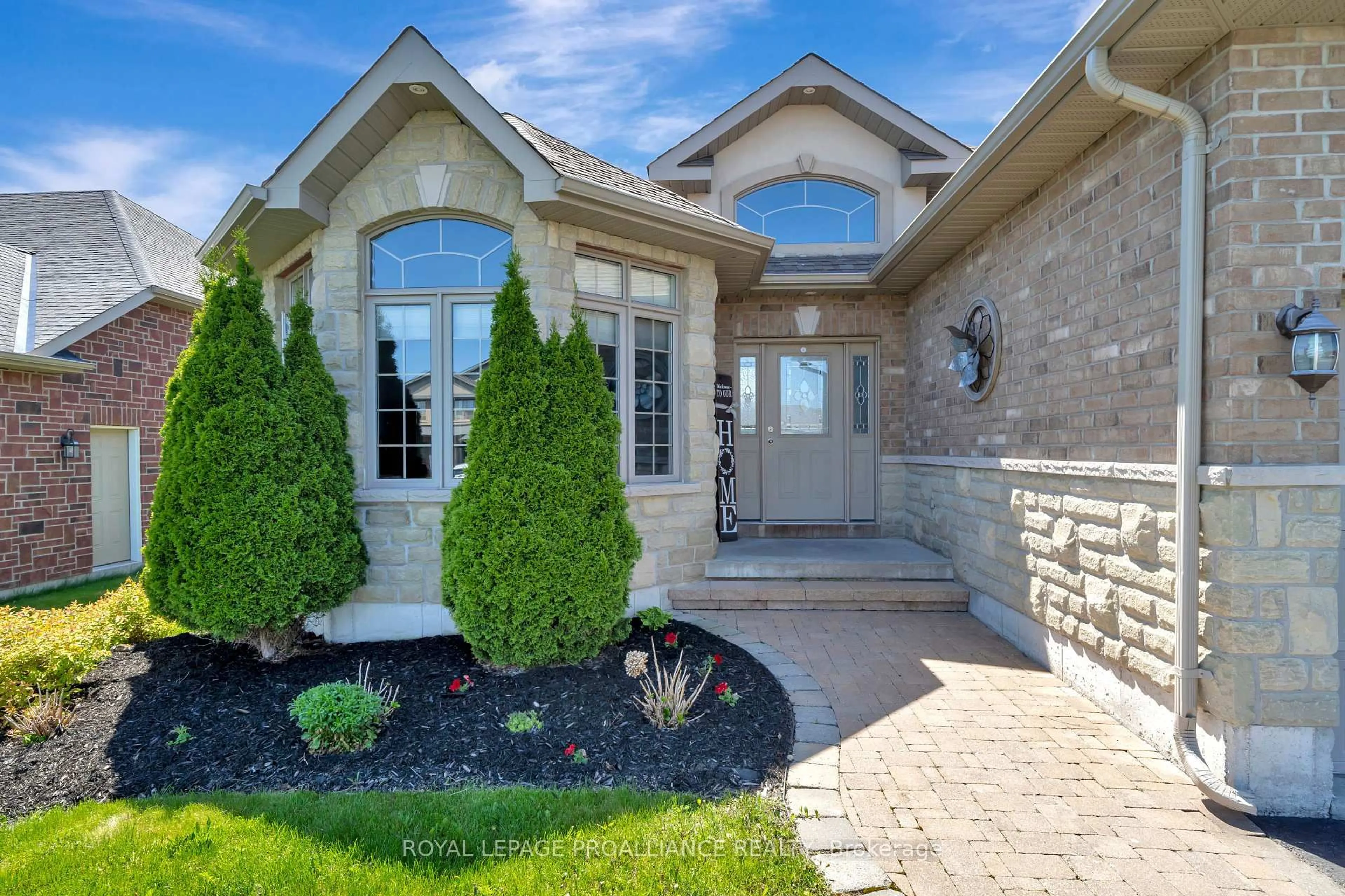 Home with brick exterior material, street for 24 Hampton Ridge Dr, Belleville Ontario K8N 0B2