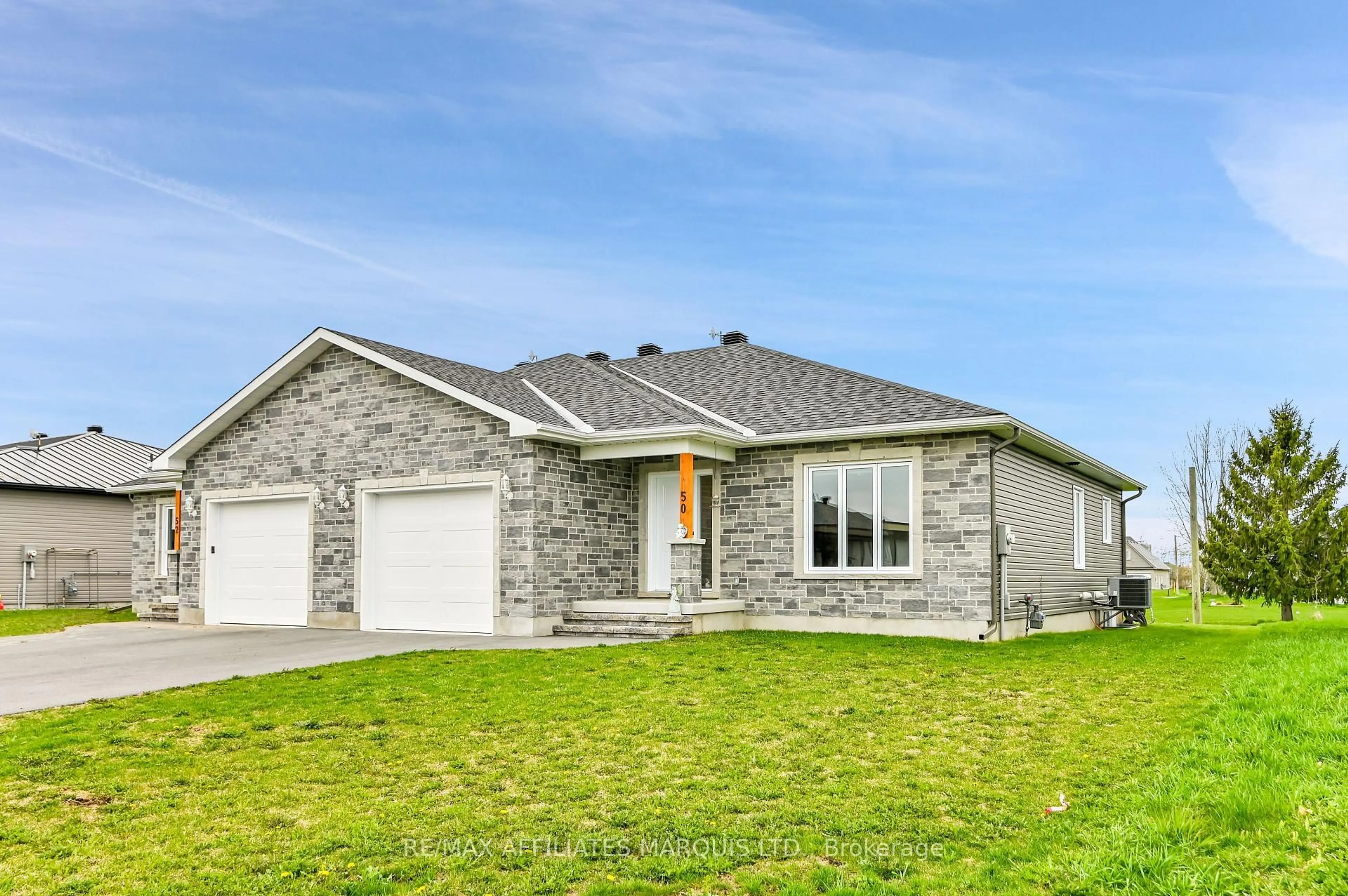 Home with brick exterior material, street for 50 ADAM St, The Nation Ontario K0A 3C0