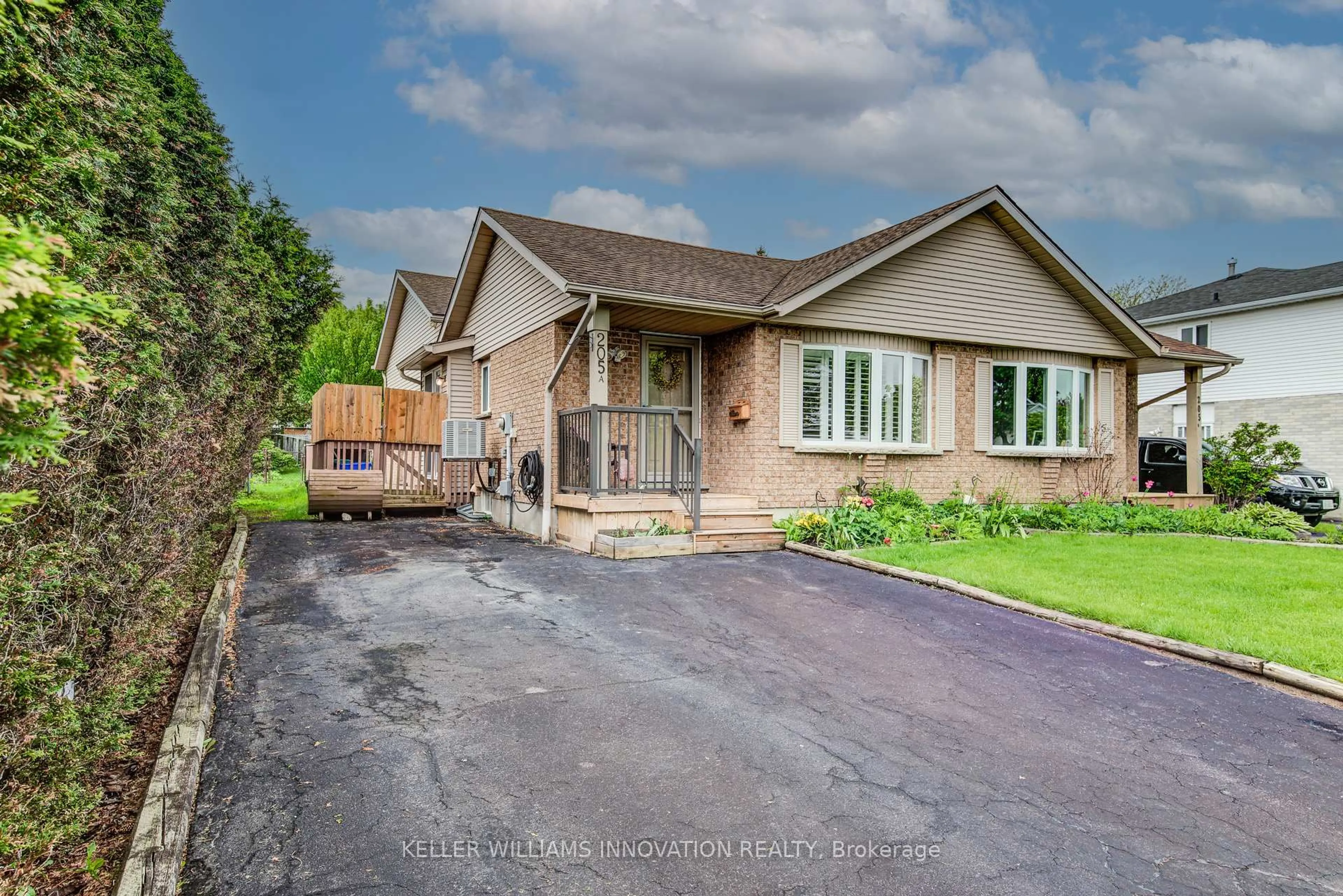 A pic from outside/outdoor area/front of a property/back of a property/a pic from drone, street for 205 AUBURN Dr #A, Waterloo Ontario N2K 3T1