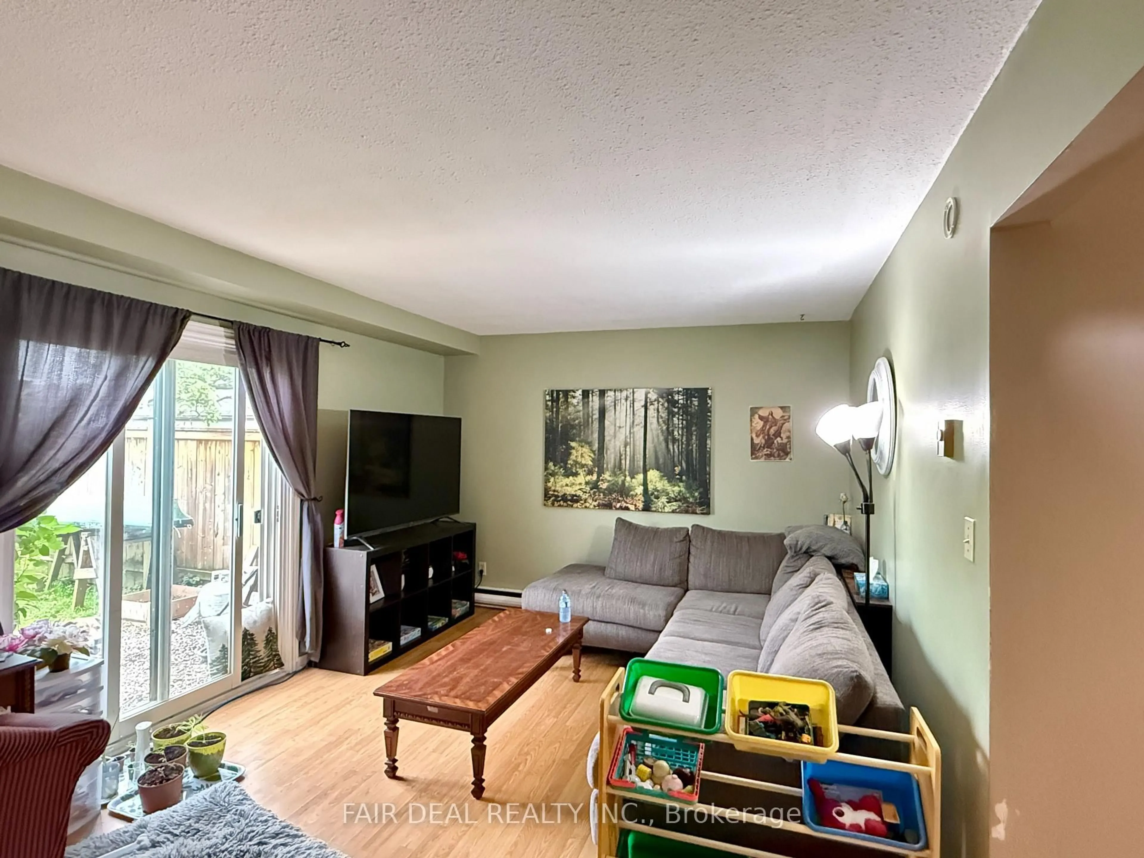 Living room with furniture, unknown for 100 Brownleigh Ave #292, Welland Ontario L3B 5V8