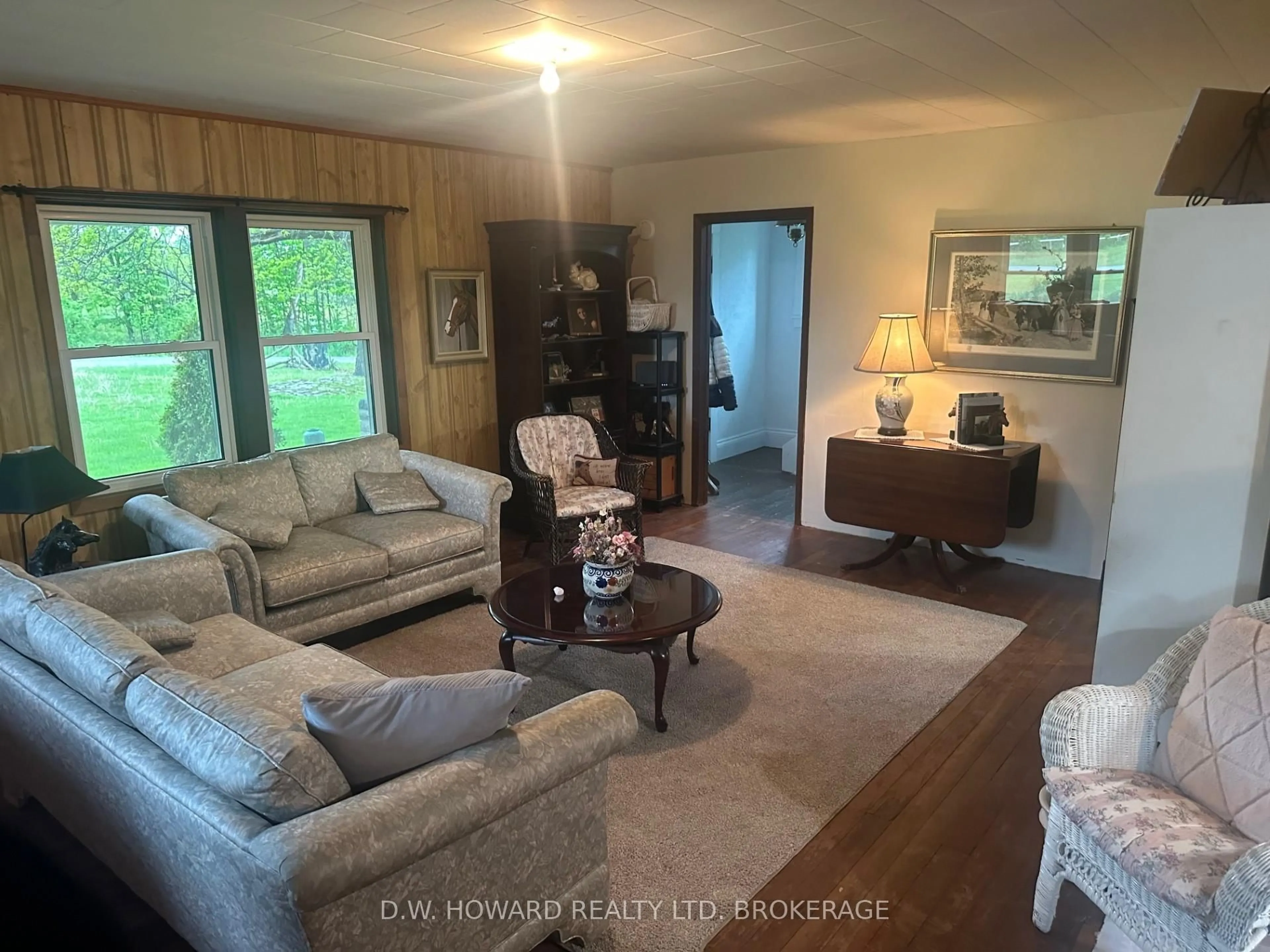 Living room with furniture, wood/laminate floor for 3276 Bertie Rd, Fort Erie Ontario L0S 1N0