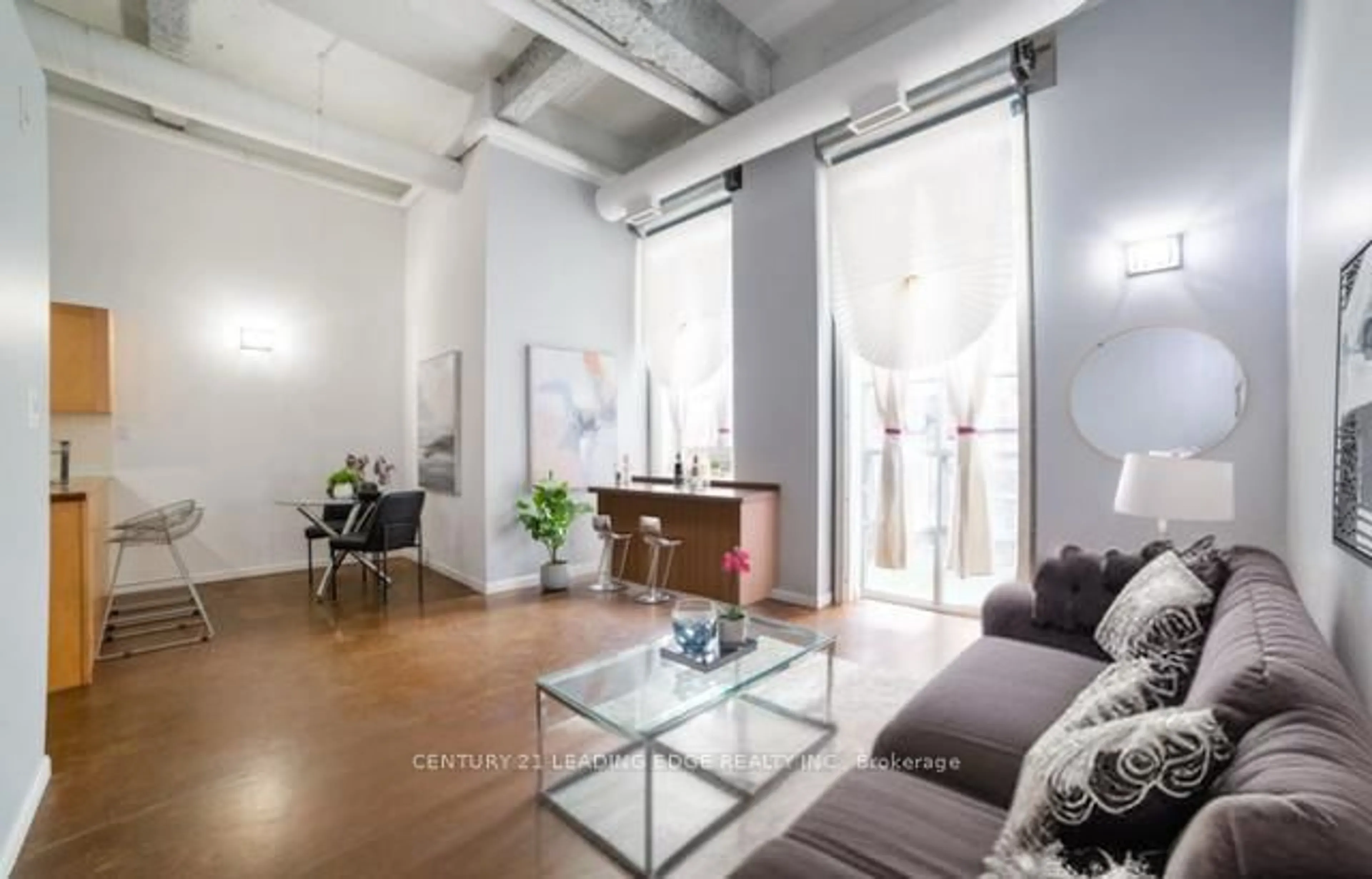 Living room with furniture, unknown for 11 Rebecca St #207, Hamilton Ontario L8R 3H7