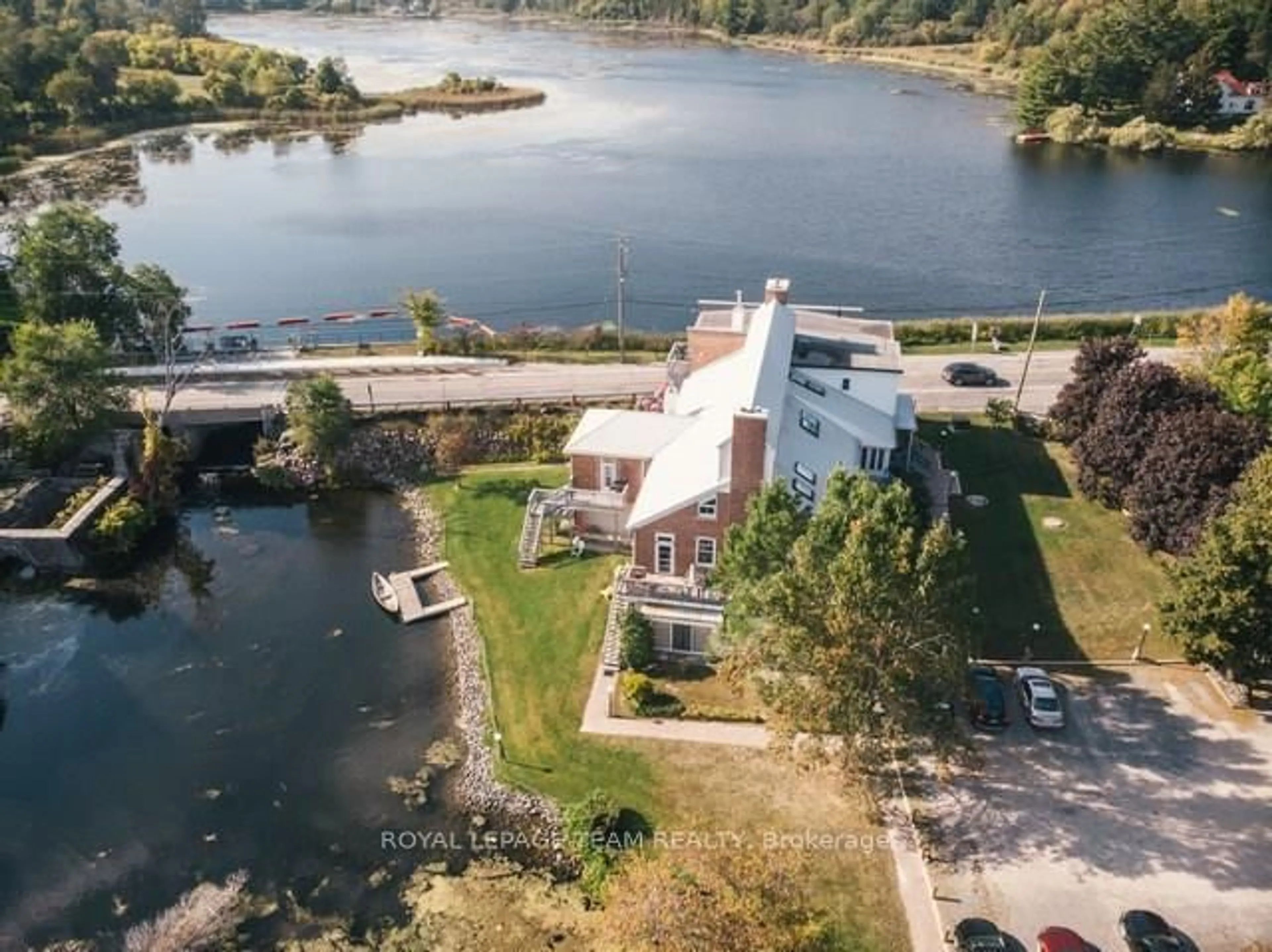 A pic from outside/outdoor area/front of a property/back of a property/a pic from drone, water/lake/river/ocean view for 19 Main St #3, Westport Ontario K0G 1X0