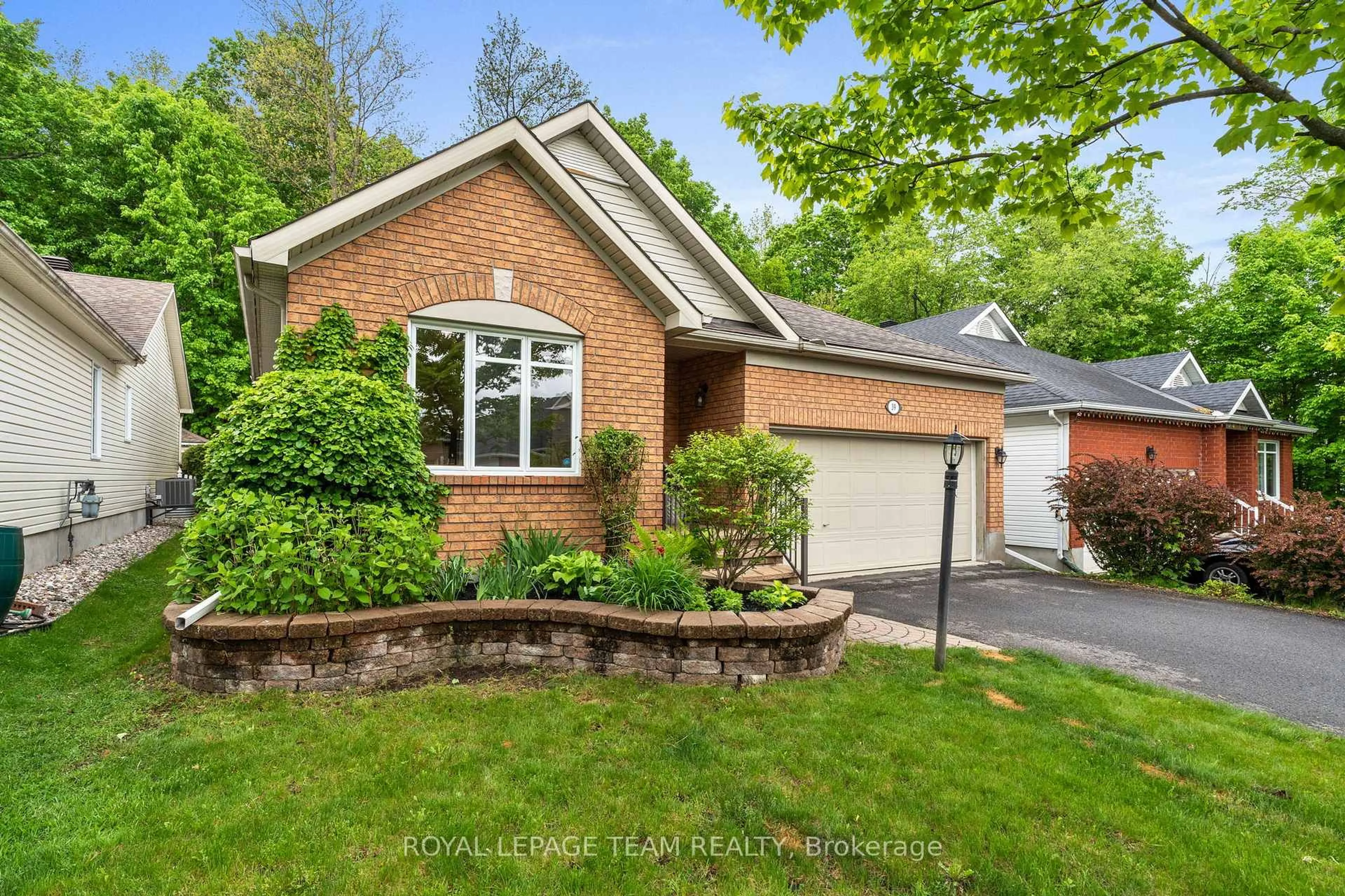 Home with brick exterior material, street for 39 FIELDCREST Ave, Ottawa Ontario K2J 4Y8