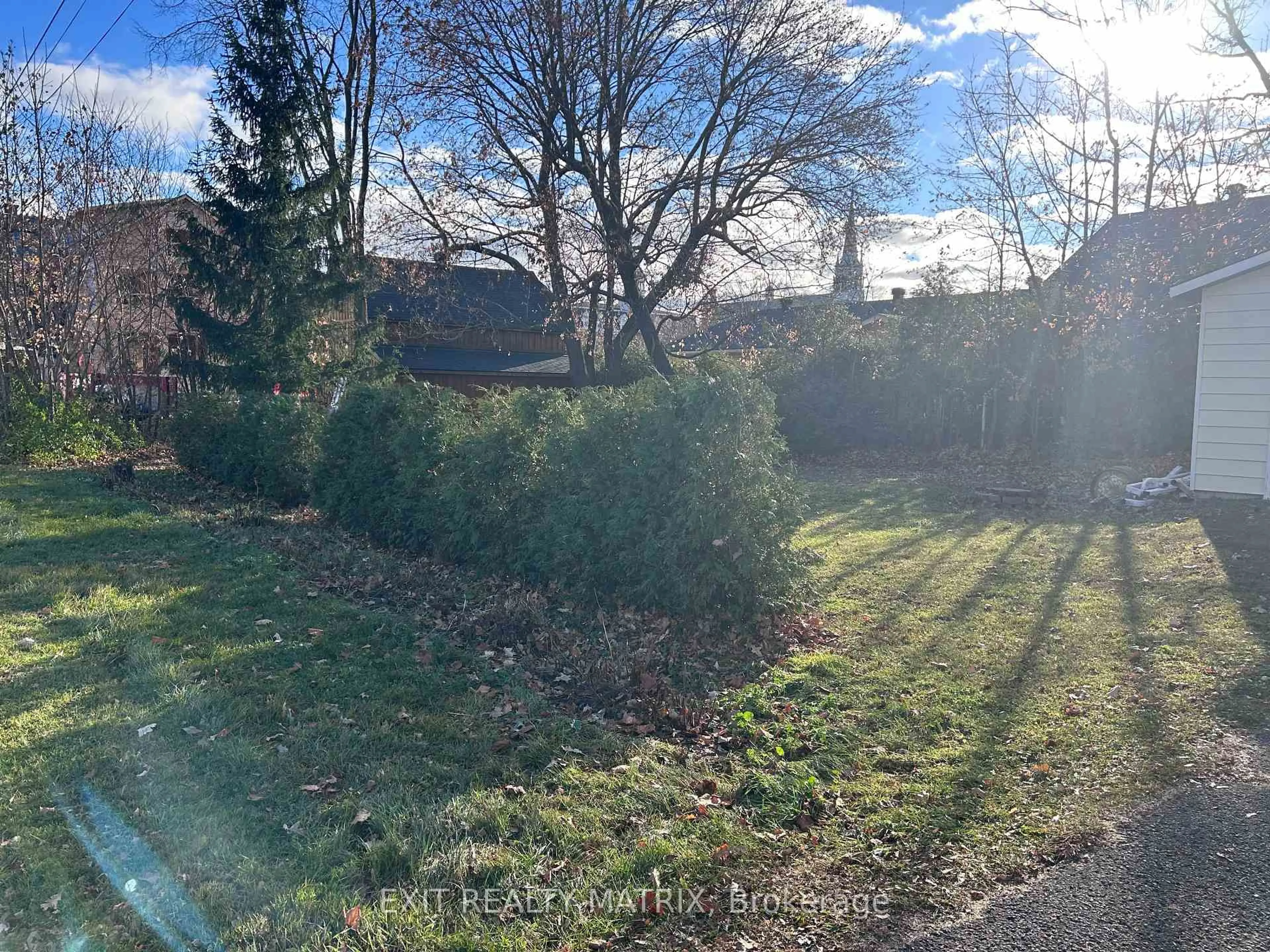 A pic from outside/outdoor area/front of a property/back of a property/a pic from drone, forest/trees view for 118 Centre St St, North Glengarry Ontario K0C 1A0