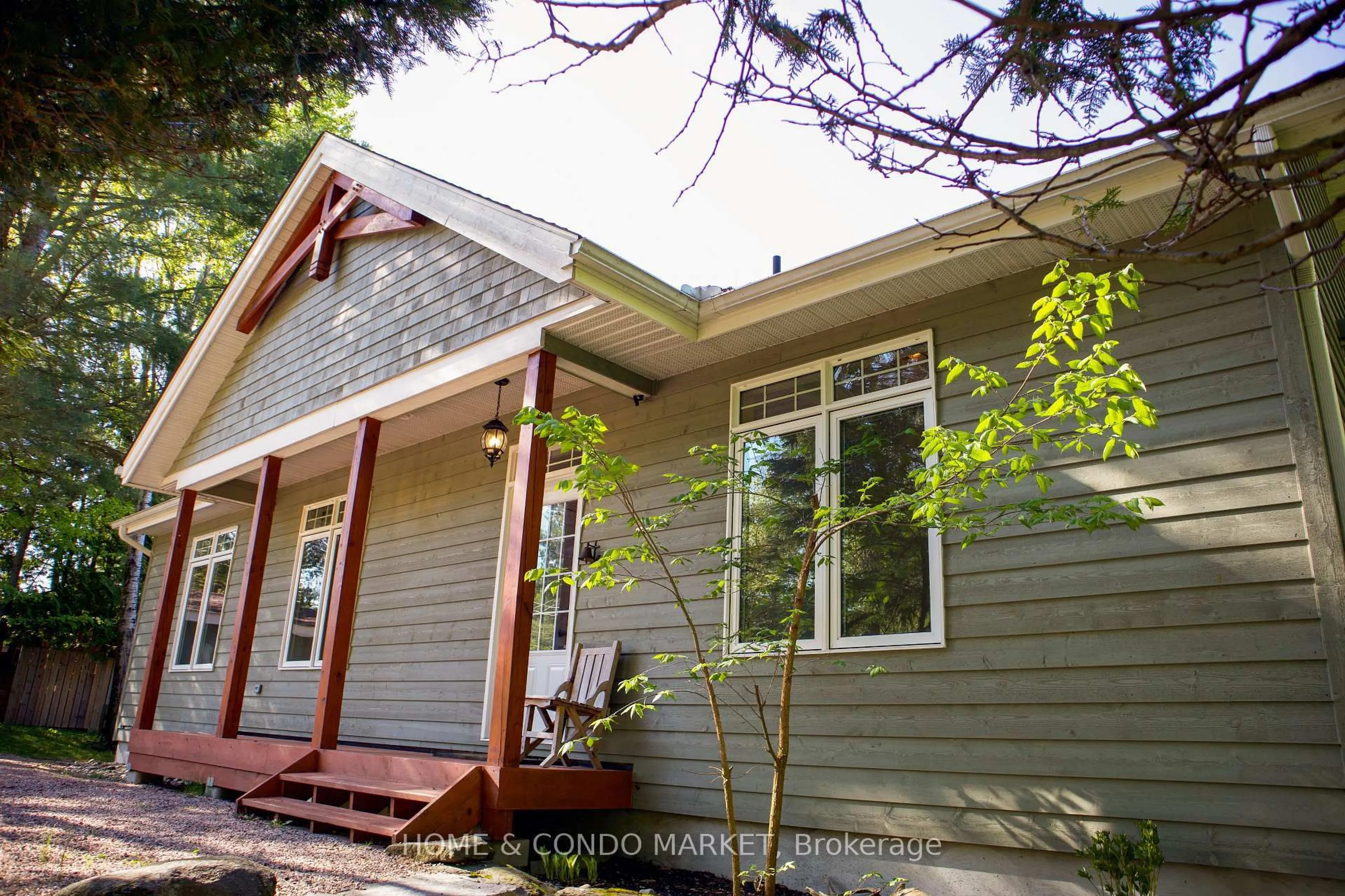 Home with vinyl exterior material, street for 14 Charles Ave, McKellar Ontario P2A 0B4