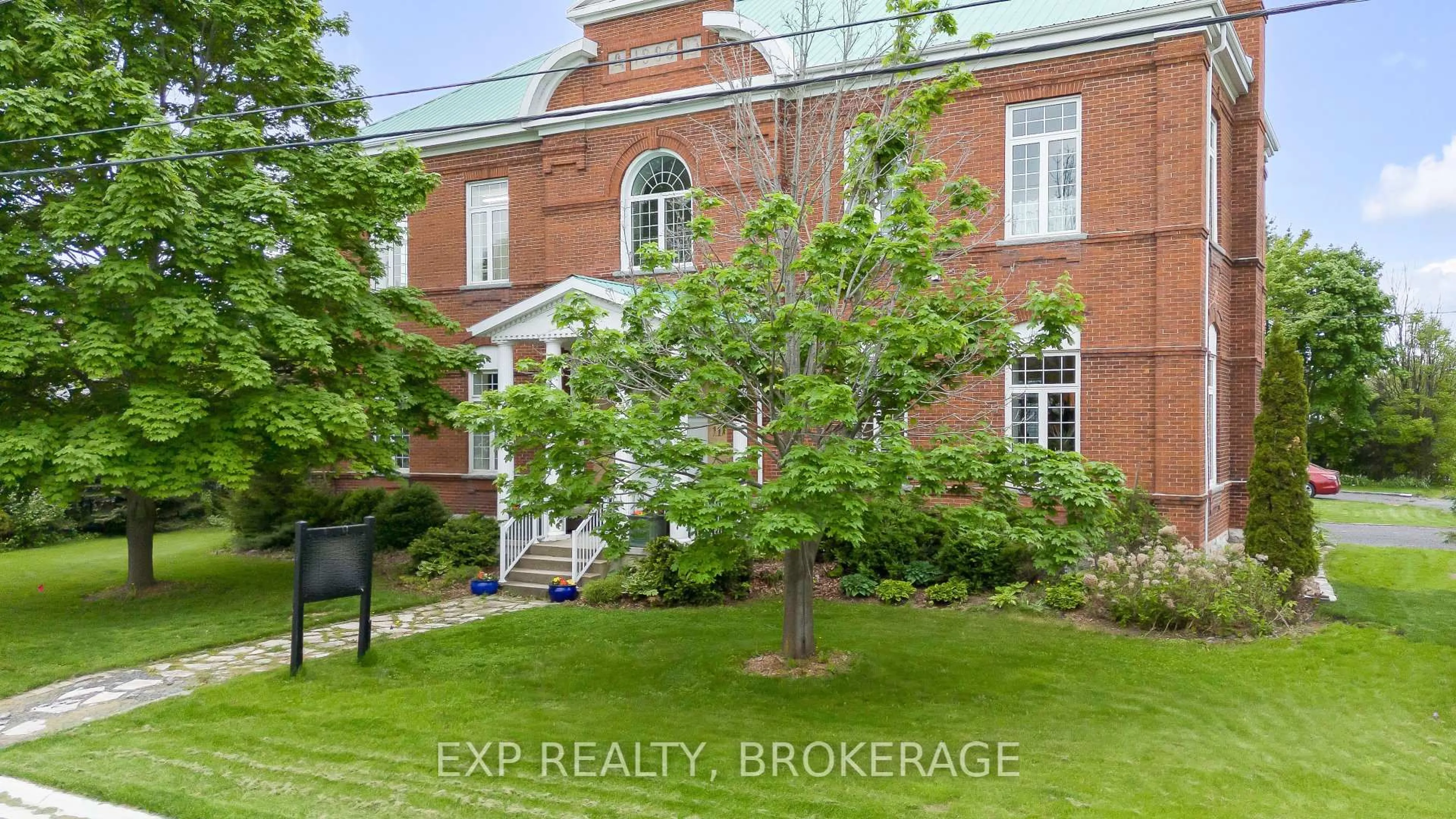 A pic from outside/outdoor area/front of a property/back of a property/a pic from drone, building for 11 CROSS St, Bissett Creek Ontario K0H 2H0