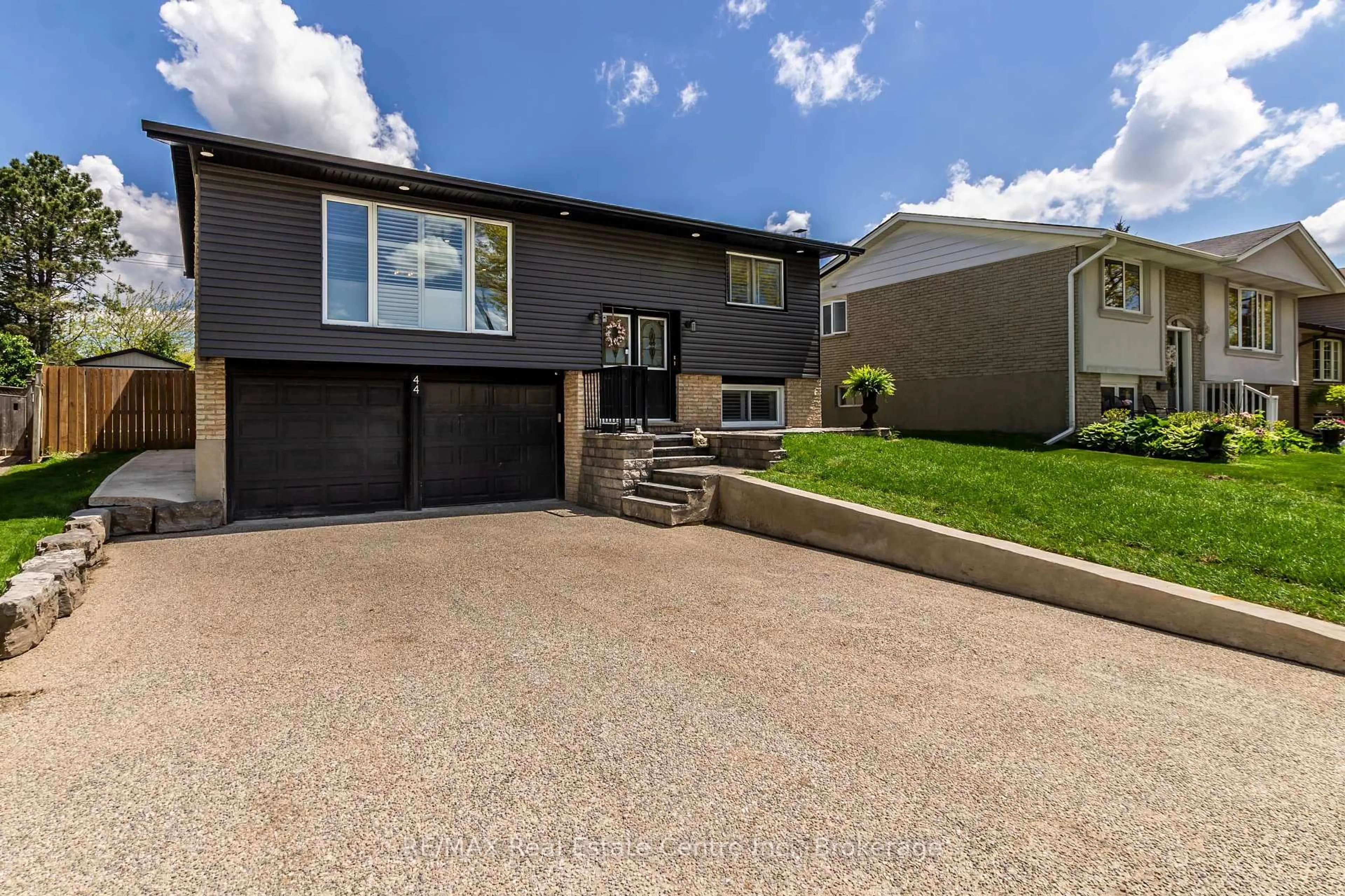 Home with vinyl exterior material, street for 44 Oakhurst Cres, Kitchener Ontario N2B 3K3