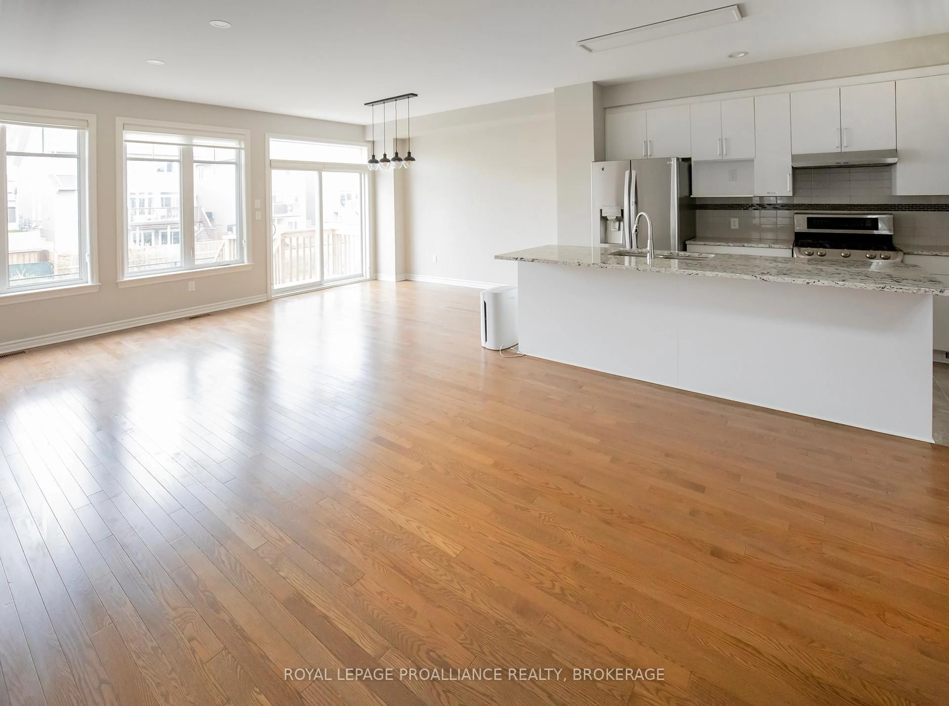 Open concept kitchen, wood/laminate floor for 1099 Horizon Dr, Kingston Ontario K7P 0M3