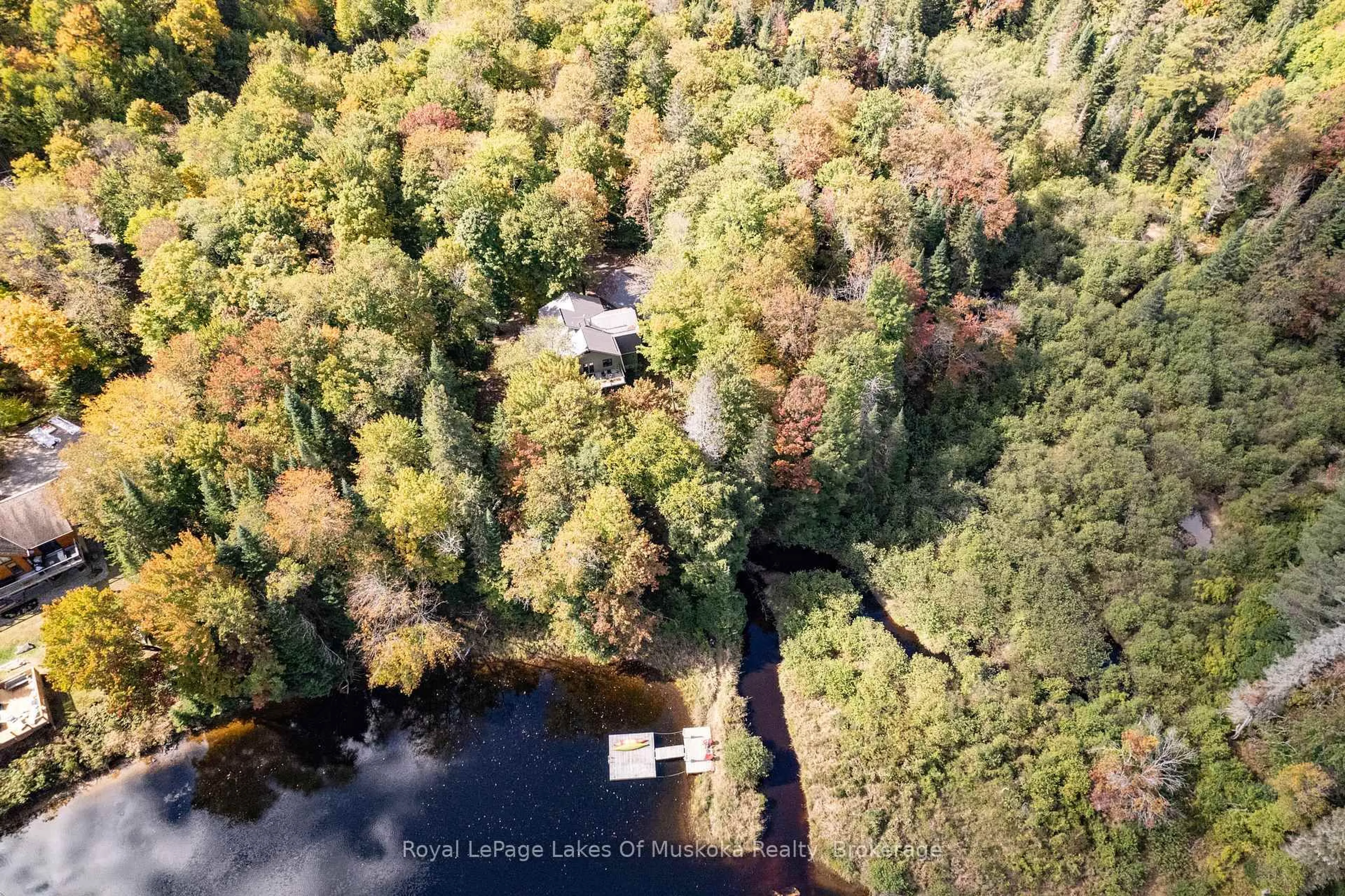A pic from outside/outdoor area/front of a property/back of a property/a pic from drone, water/lake/river/ocean view for 195 River Valley Dr, Huntsville Ontario P0B 1C0