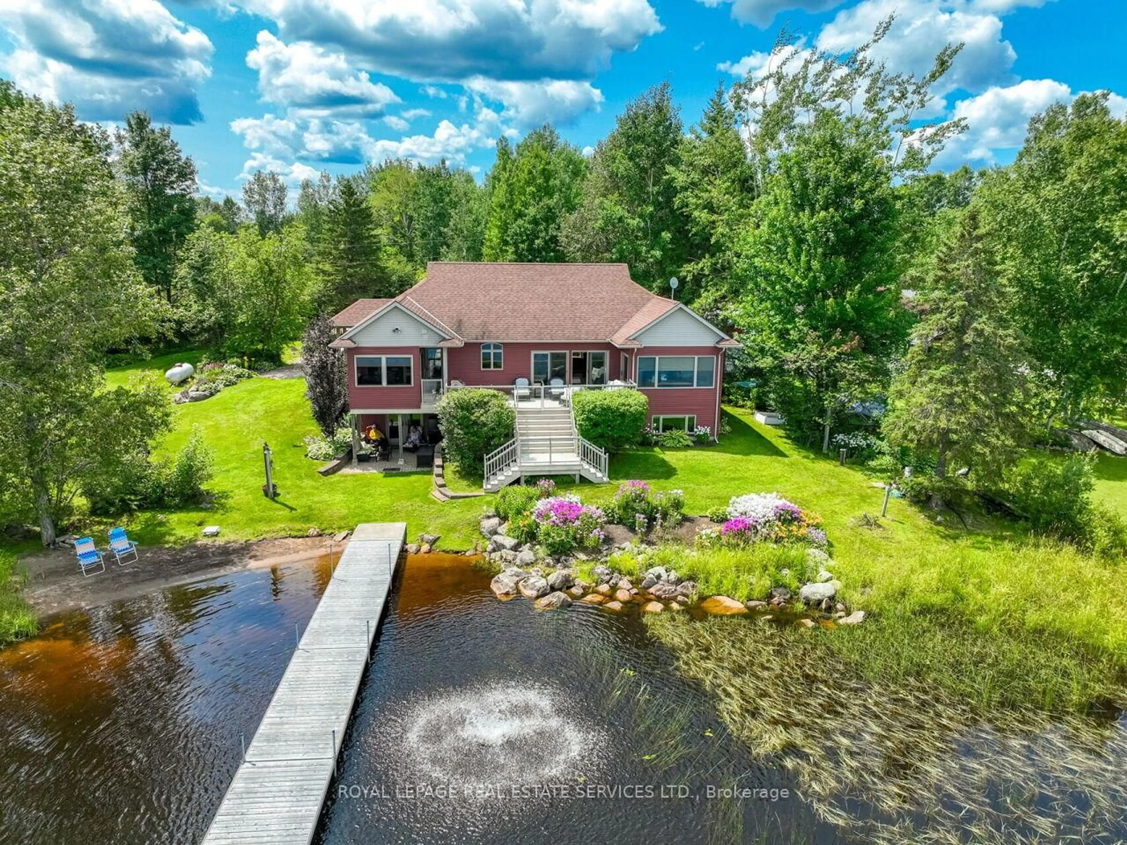 A pic from outside/outdoor area/front of a property/back of a property/a pic from drone, water/lake/river/ocean view for 114 Islandview Lane, Chisholm Ontario P0H 1Z0
