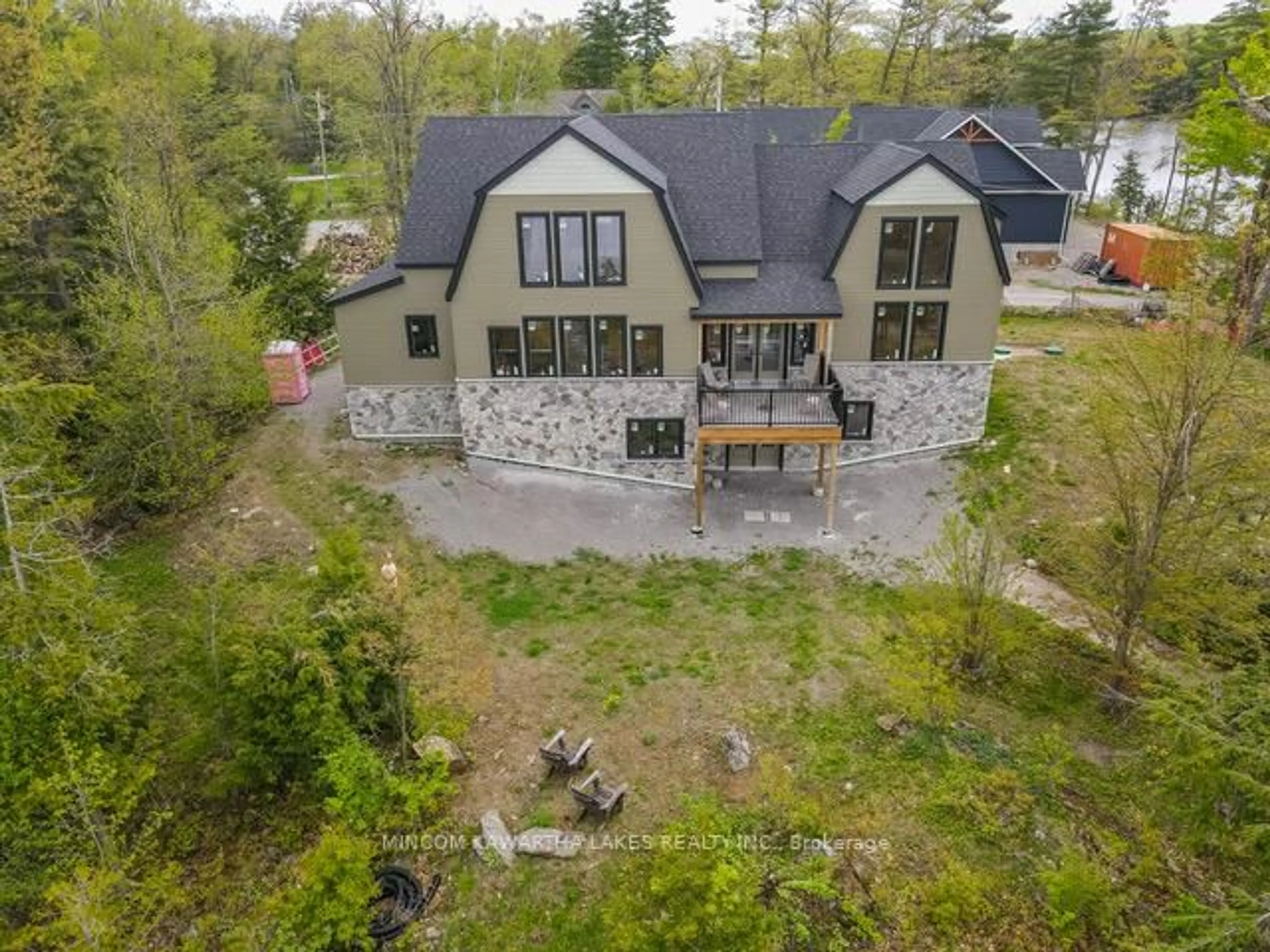 A pic from outside/outdoor area/front of a property/back of a property/a pic from drone, unknown for 16 Evergreen Way, Trent Lakes Ontario K0M 1A0