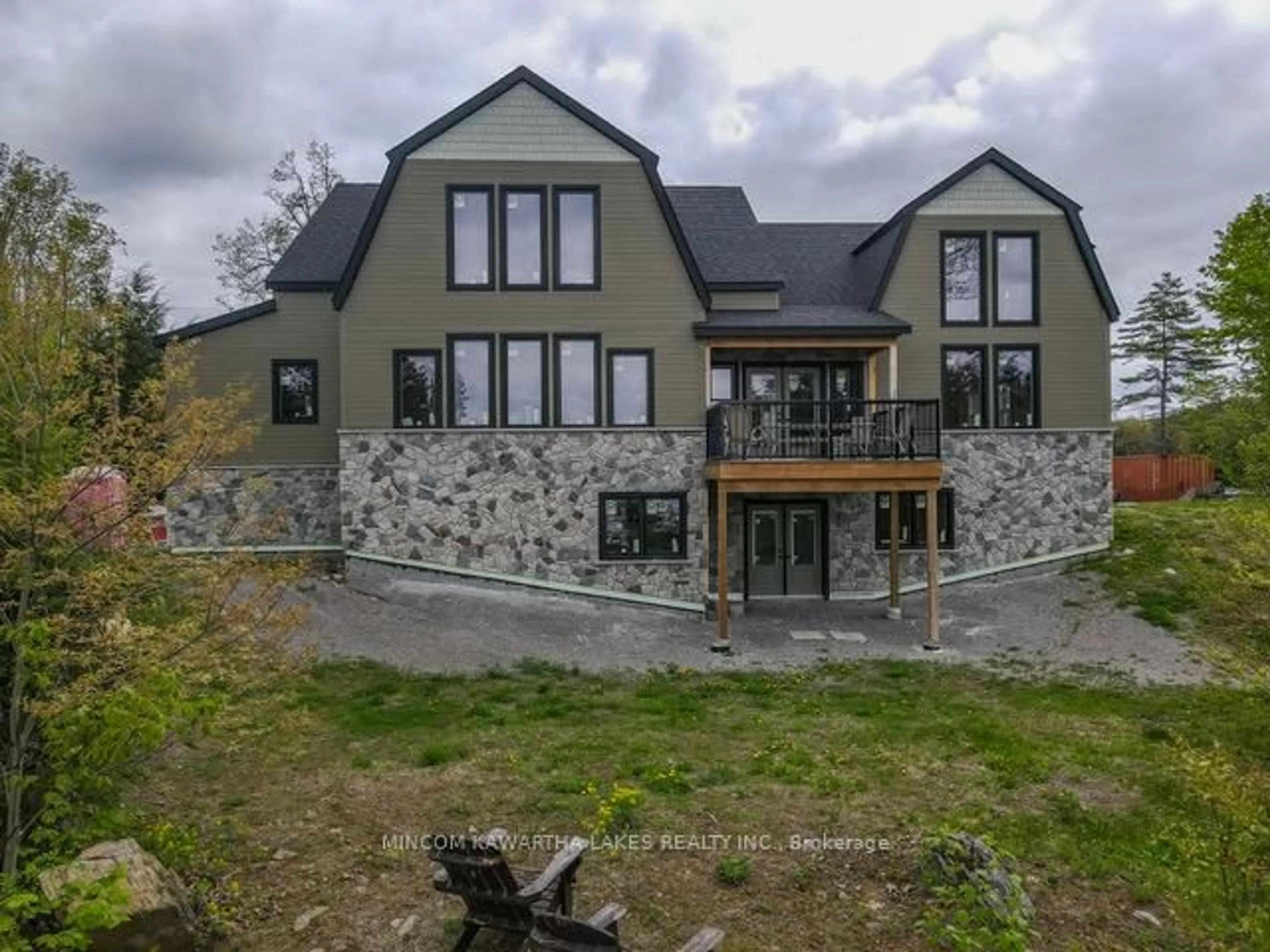 A pic from outside/outdoor area/front of a property/back of a property/a pic from drone, mountain view for 16 Evergreen Way, Trent Lakes Ontario K0M 1A0