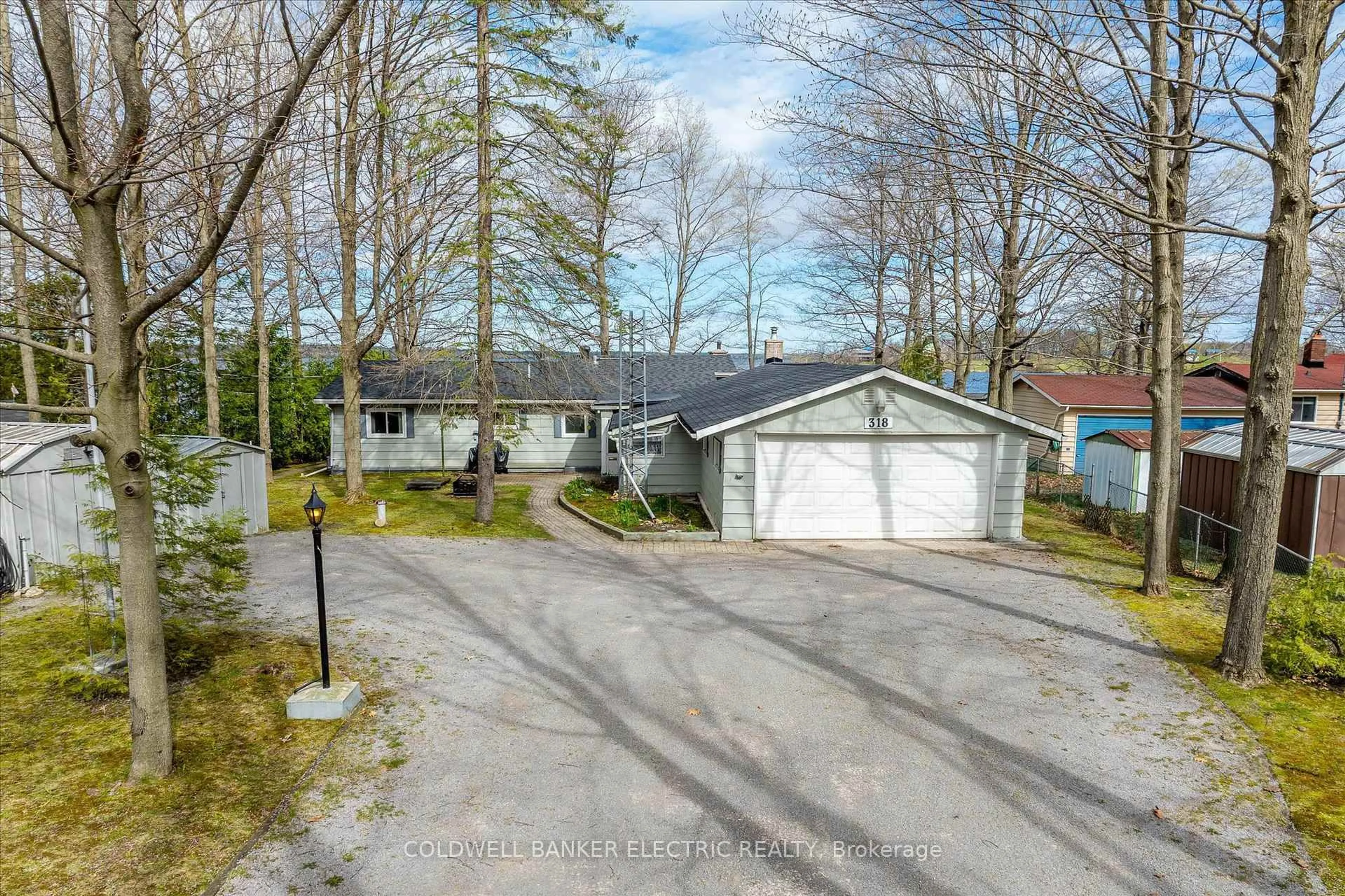 A pic from outside/outdoor area/front of a property/back of a property/a pic from drone, street for 318 Fothergill Isle N/A, Selwyn Ontario K9J 6X2