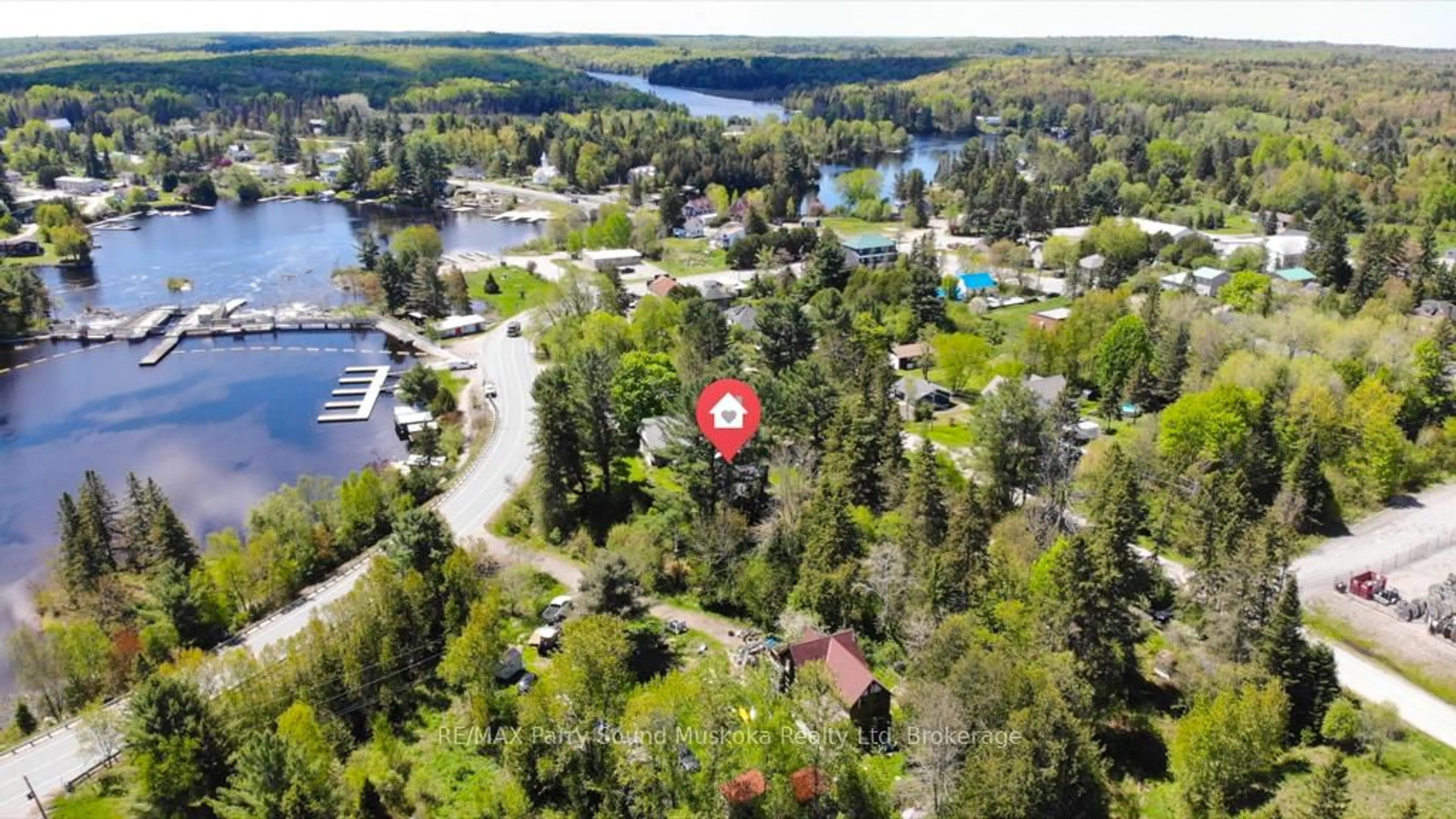 A pic from outside/outdoor area/front of a property/back of a property/a pic from drone, water/lake/river/ocean view for 51 Biddy St, Magnetawan Ontario P0A 1P0
