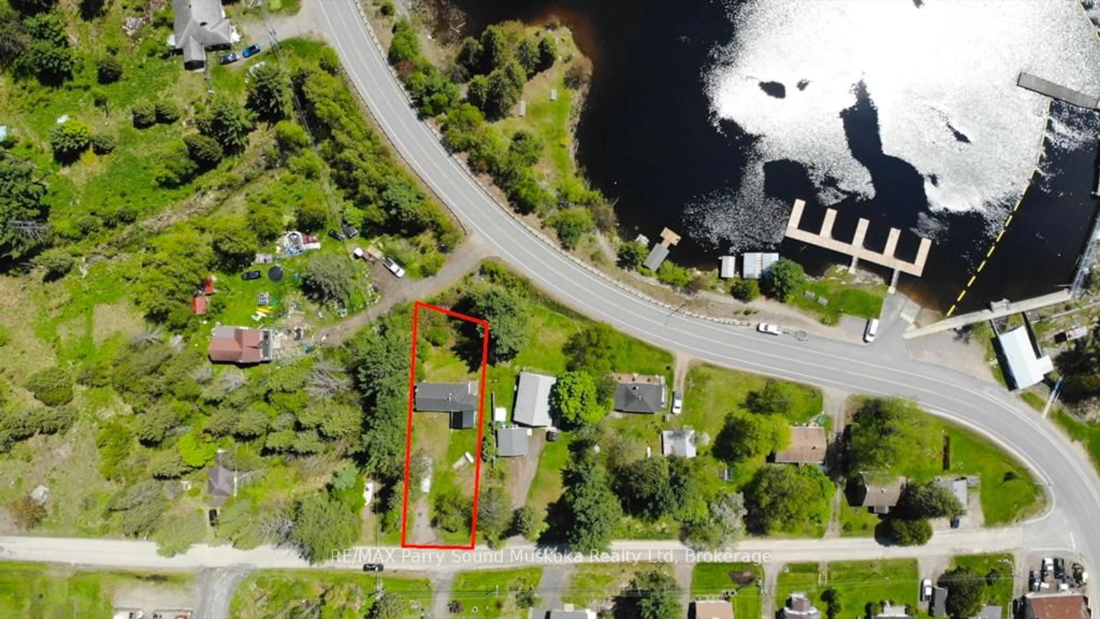 A pic from outside/outdoor area/front of a property/back of a property/a pic from drone, water/lake/river/ocean view for 51 Biddy St, Magnetawan Ontario P0A 1P0