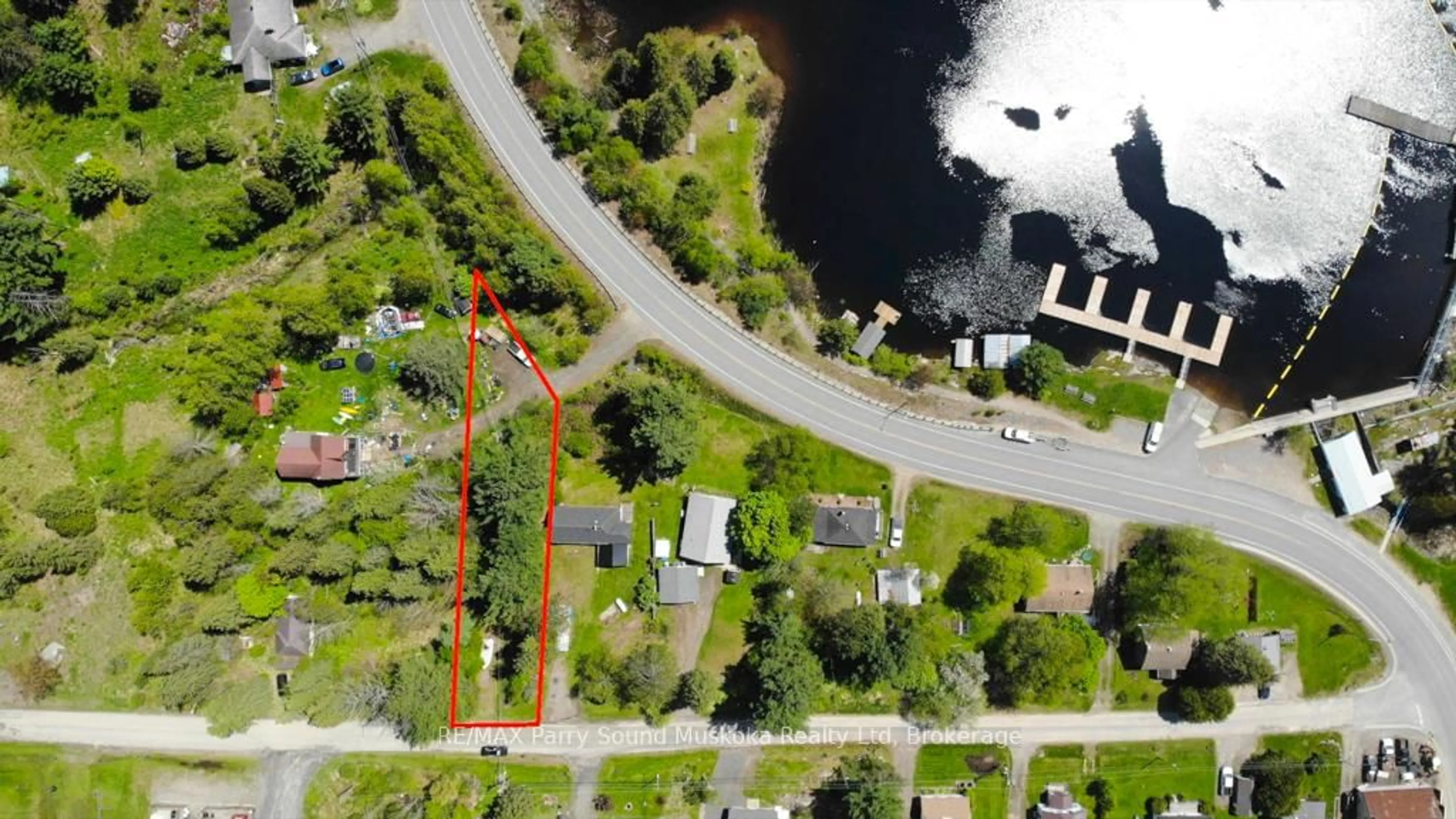 A pic from outside/outdoor area/front of a property/back of a property/a pic from drone, water/lake/river/ocean view for 51 Biddy St, Magnetawan Ontario P0A 1P0