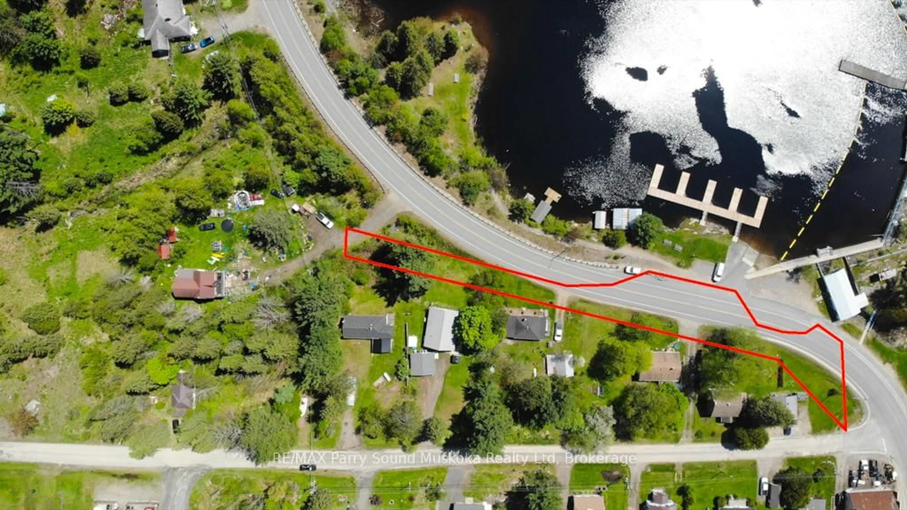 A pic from outside/outdoor area/front of a property/back of a property/a pic from drone, water/lake/river/ocean view for 51 Biddy St, Magnetawan Ontario P0A 1P0