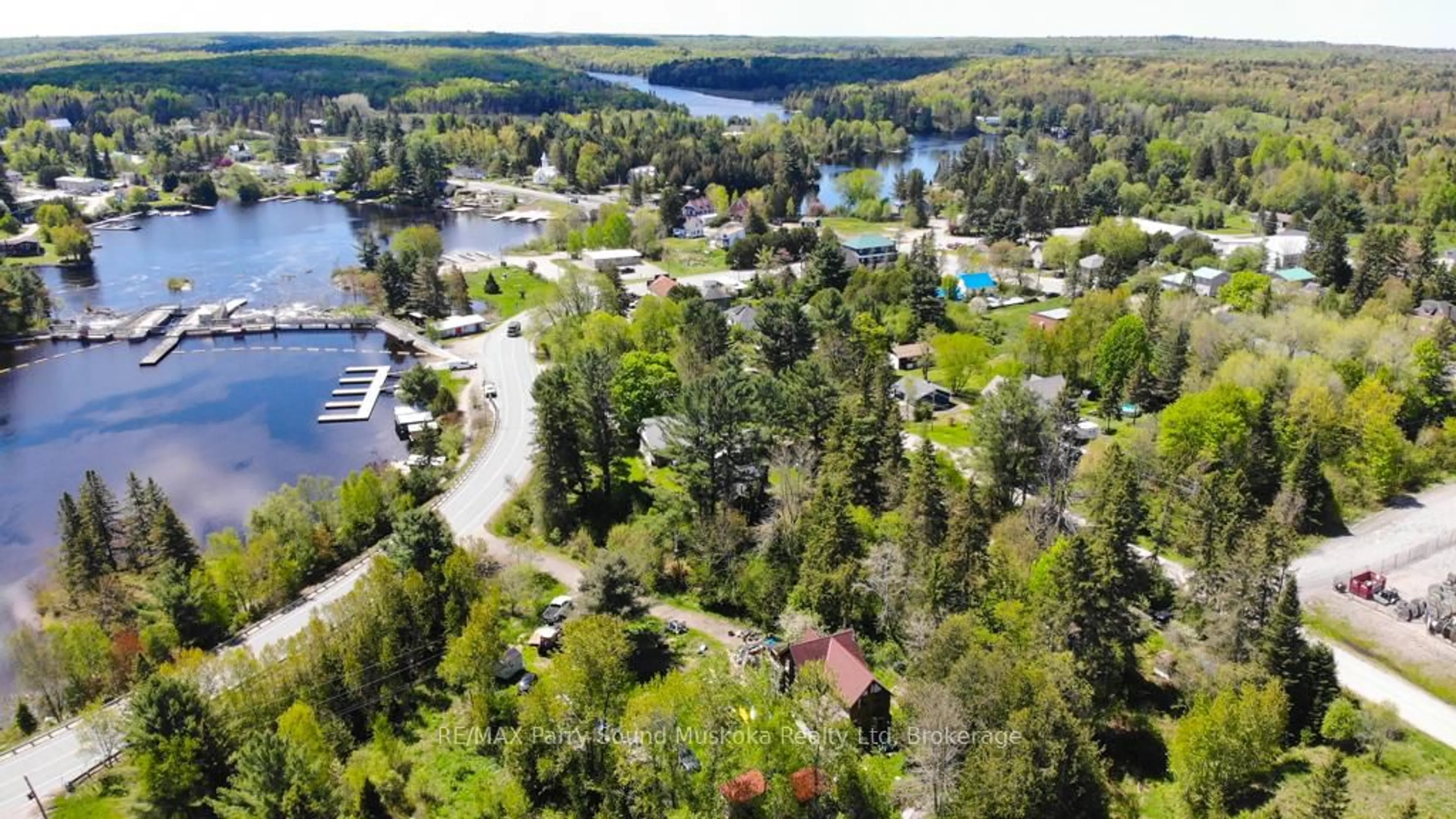 A pic from outside/outdoor area/front of a property/back of a property/a pic from drone, water/lake/river/ocean view for 51 Biddy St, Magnetawan Ontario P0A 1P0
