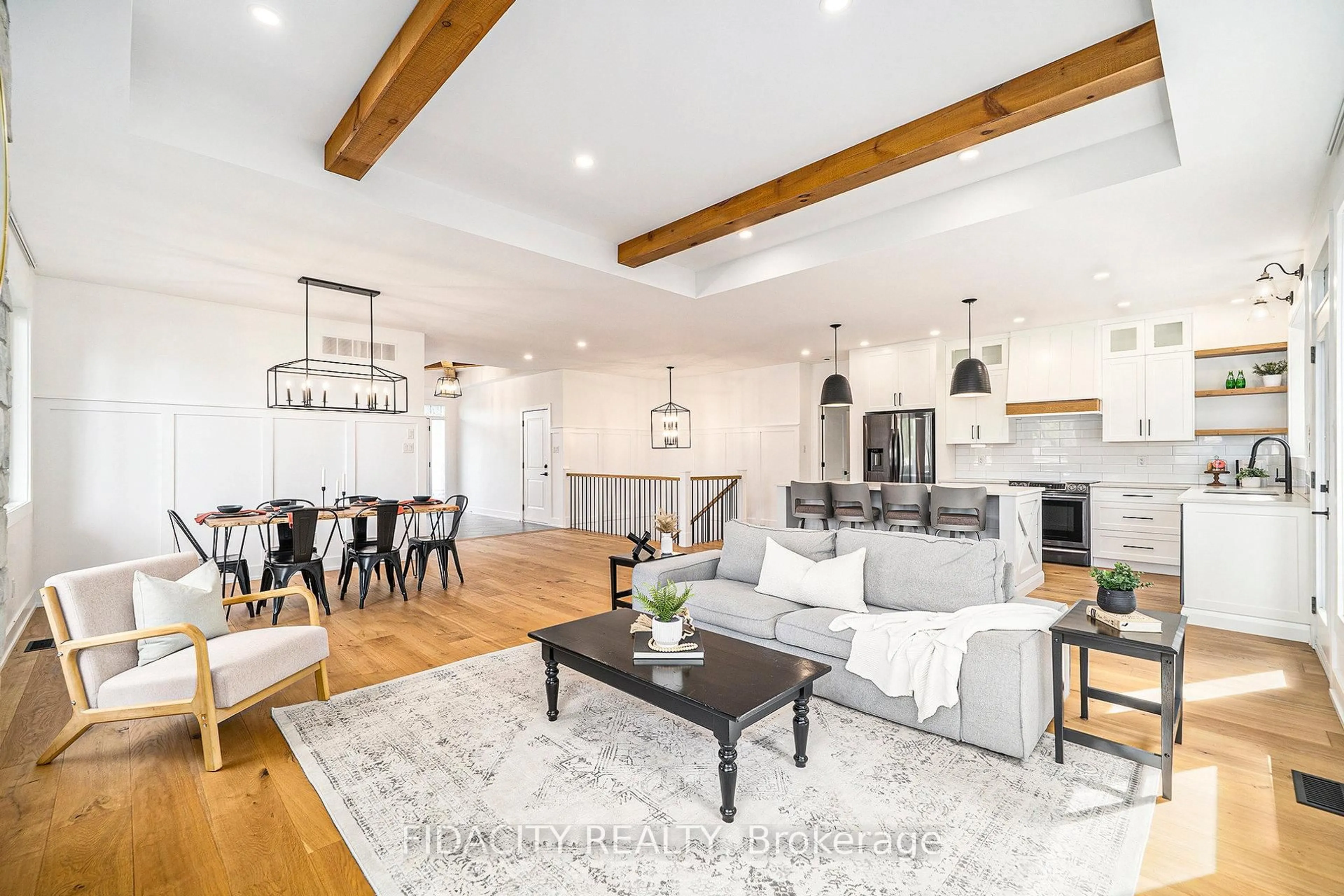 Open concept kitchen, wood/laminate floor for 19 Brigade Ave, Ottawa Ontario K2S 1J5