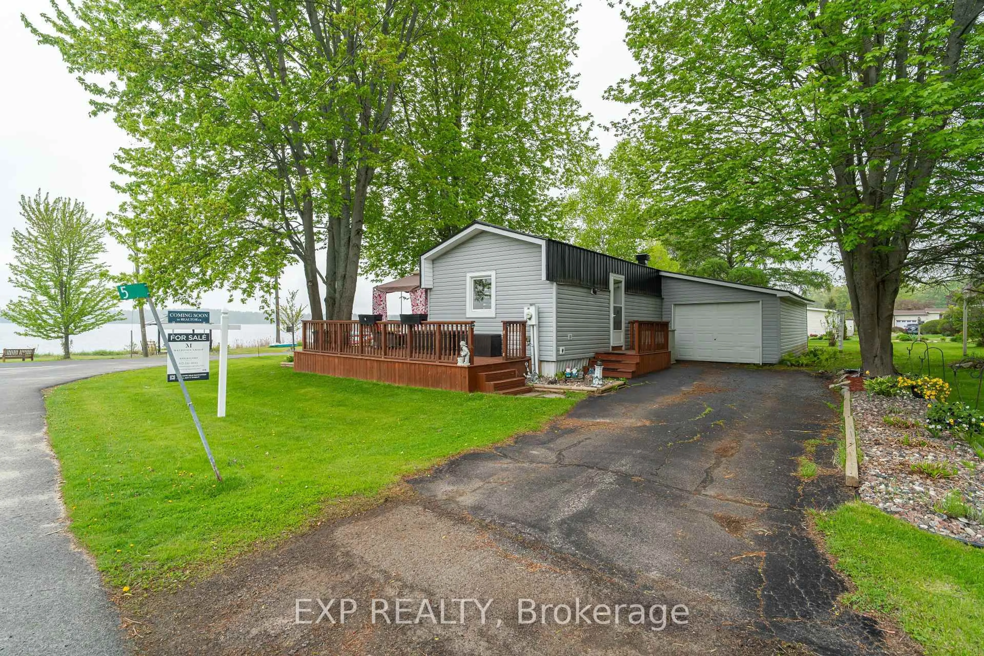 A pic from outside/outdoor area/front of a property/back of a property/a pic from drone, water/lake/river/ocean view for 5 Evergreen Lane, White Lake Ontario K0A 3L0