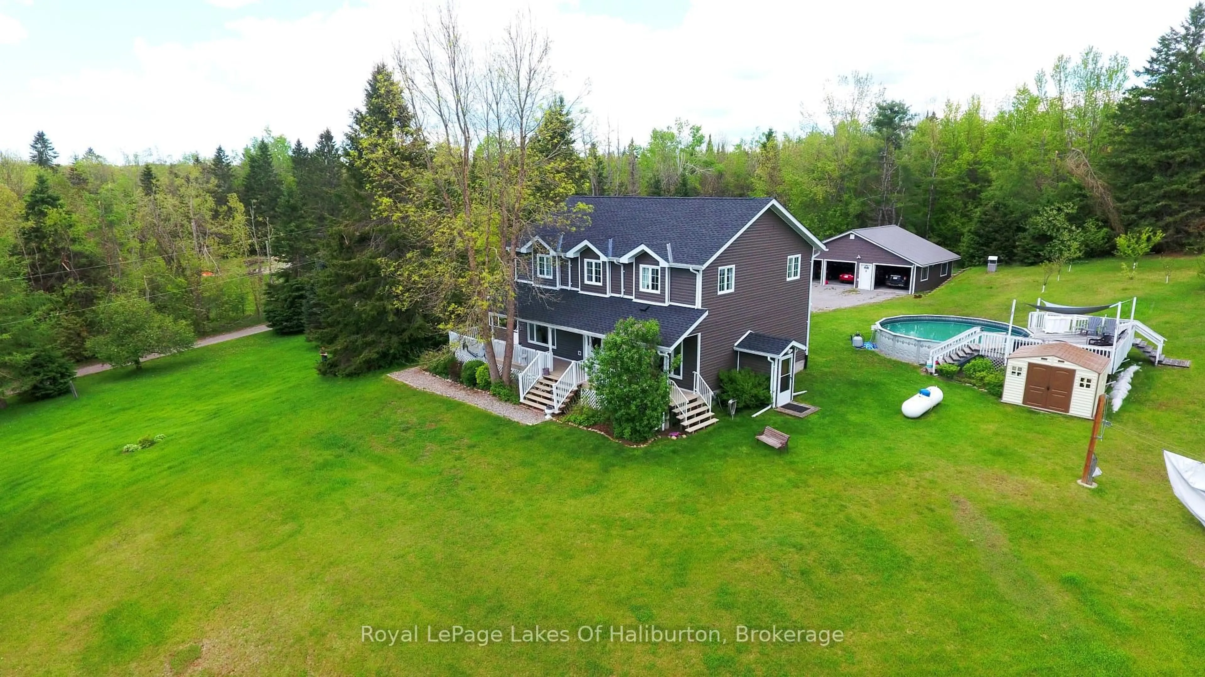 A pic from outside/outdoor area/front of a property/back of a property/a pic from drone, water/lake/river/ocean view for 24 FIRE ROUTE 369 N/A, Trent Lakes Ontario K0M 2A0