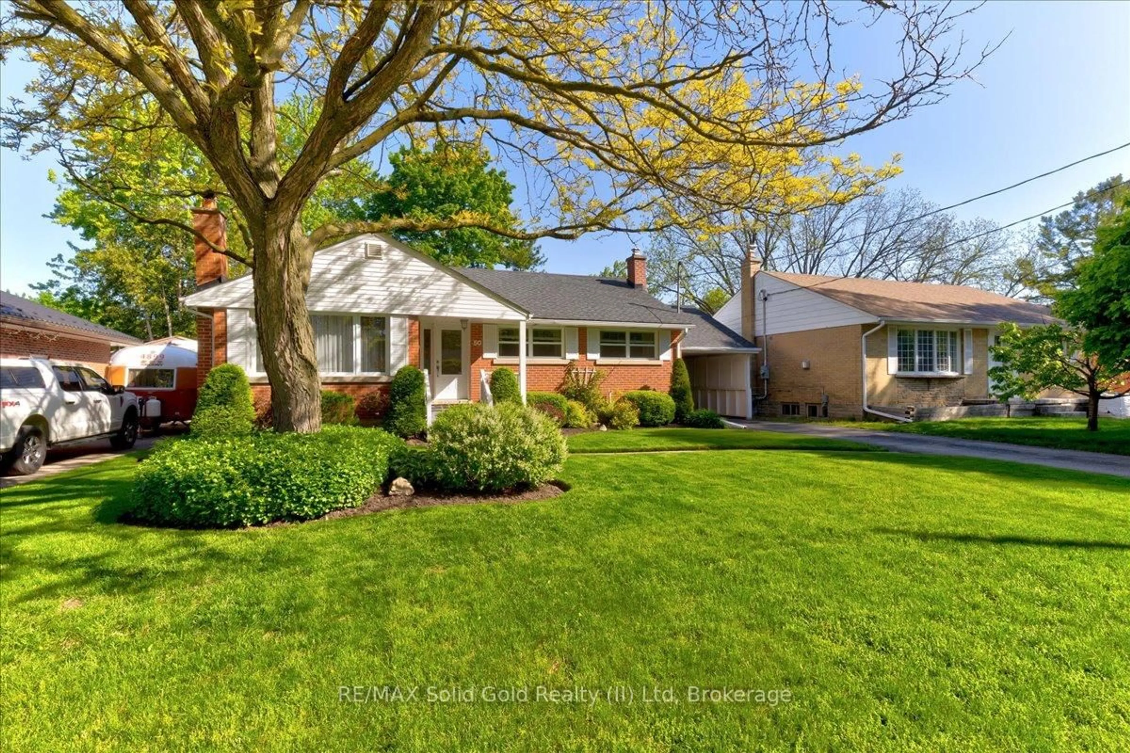 Home with brick exterior material, street for 50 Wandsworth Pl, Kitchener Ontario N2B 1J1