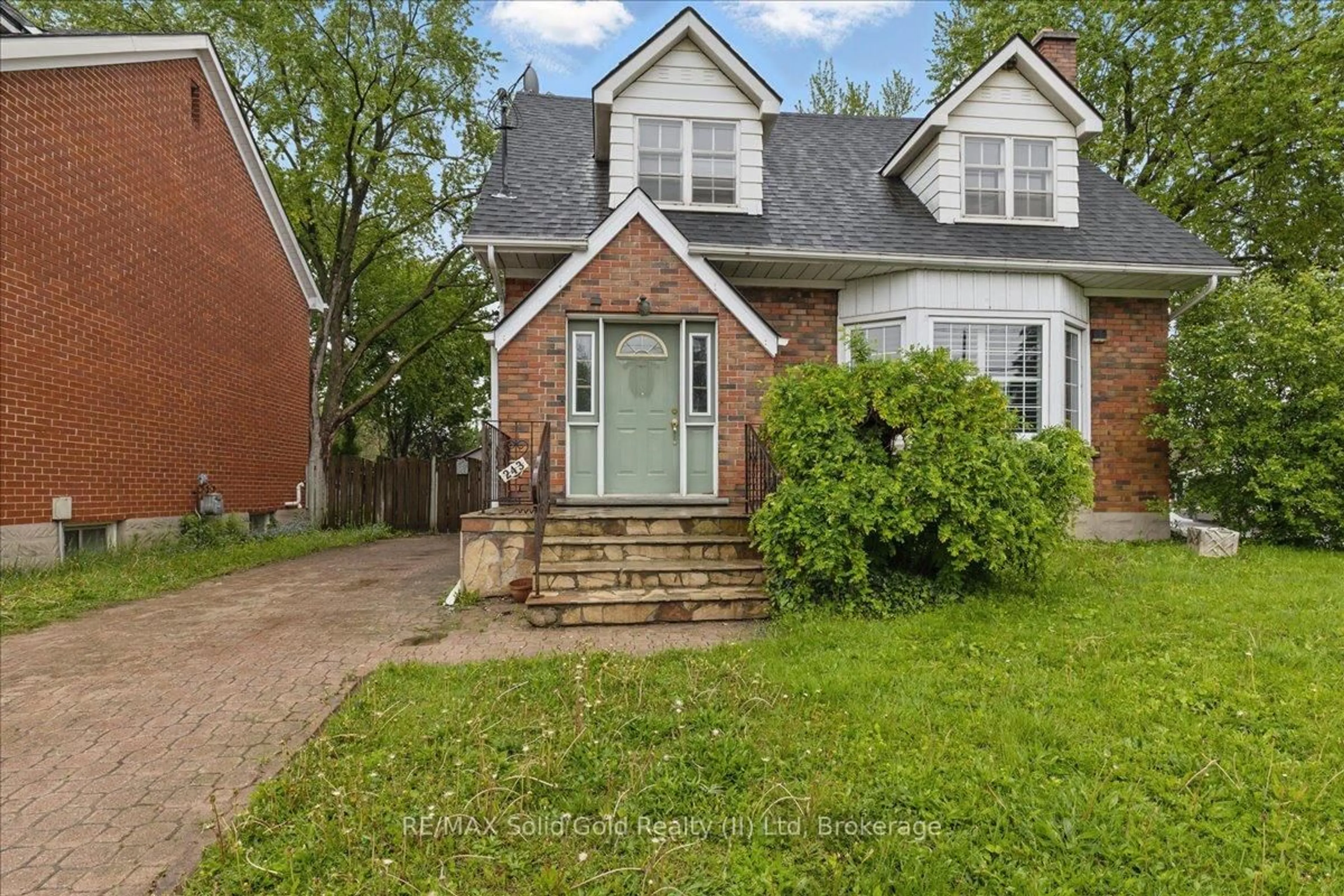 Home with brick exterior material, street for 243 Sydney St, Kitchener Ontario N2G 3V6