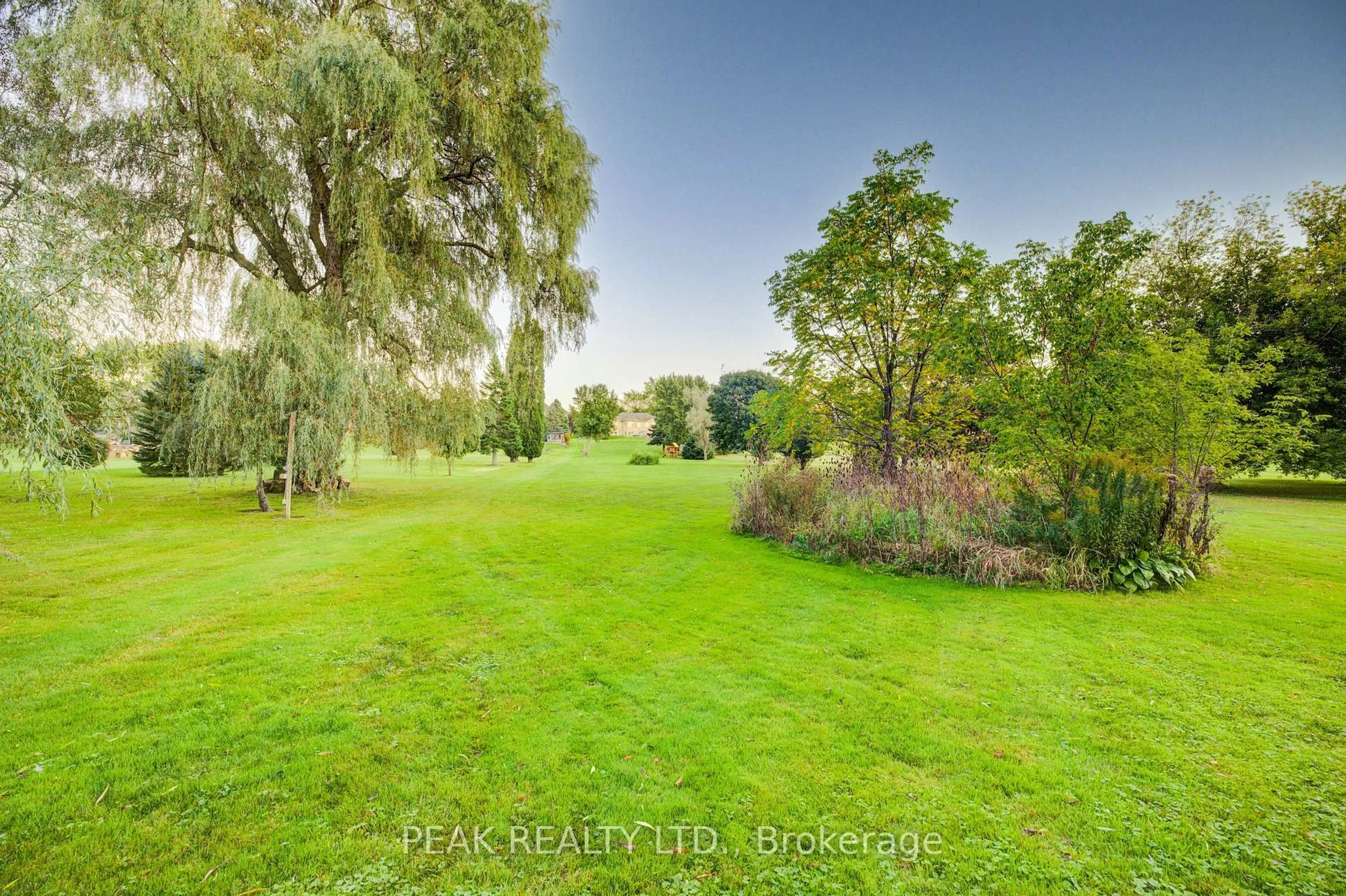 A pic from outside/outdoor area/front of a property/back of a property/a pic from drone, forest/trees view for 498 Fairview St, Wilmot Ontario N3A 1M7