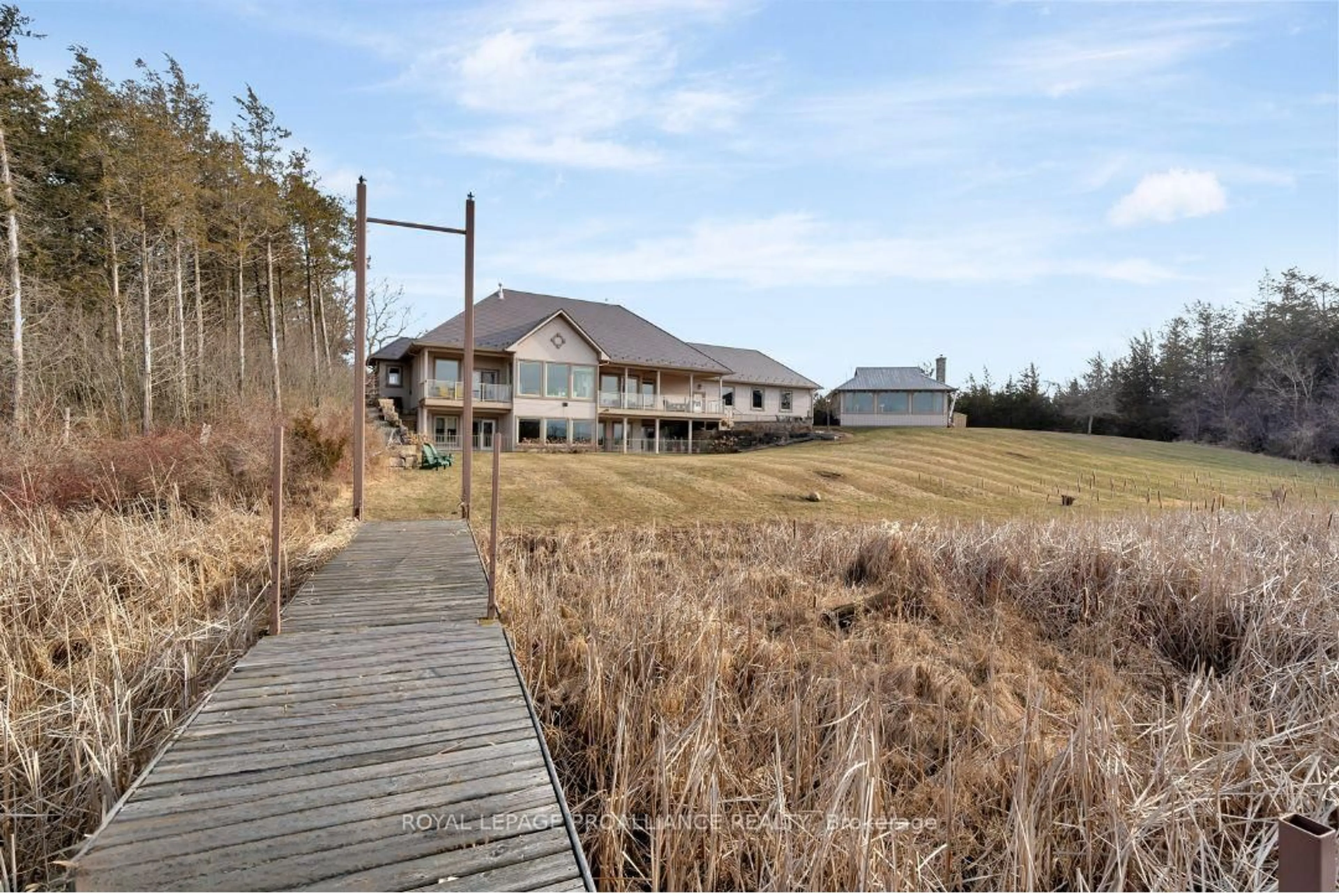 A pic from outside/outdoor area/front of a property/back of a property/a pic from drone, unknown for 2691 County Road 15, Prince Edward County Ontario K0K 2T0
