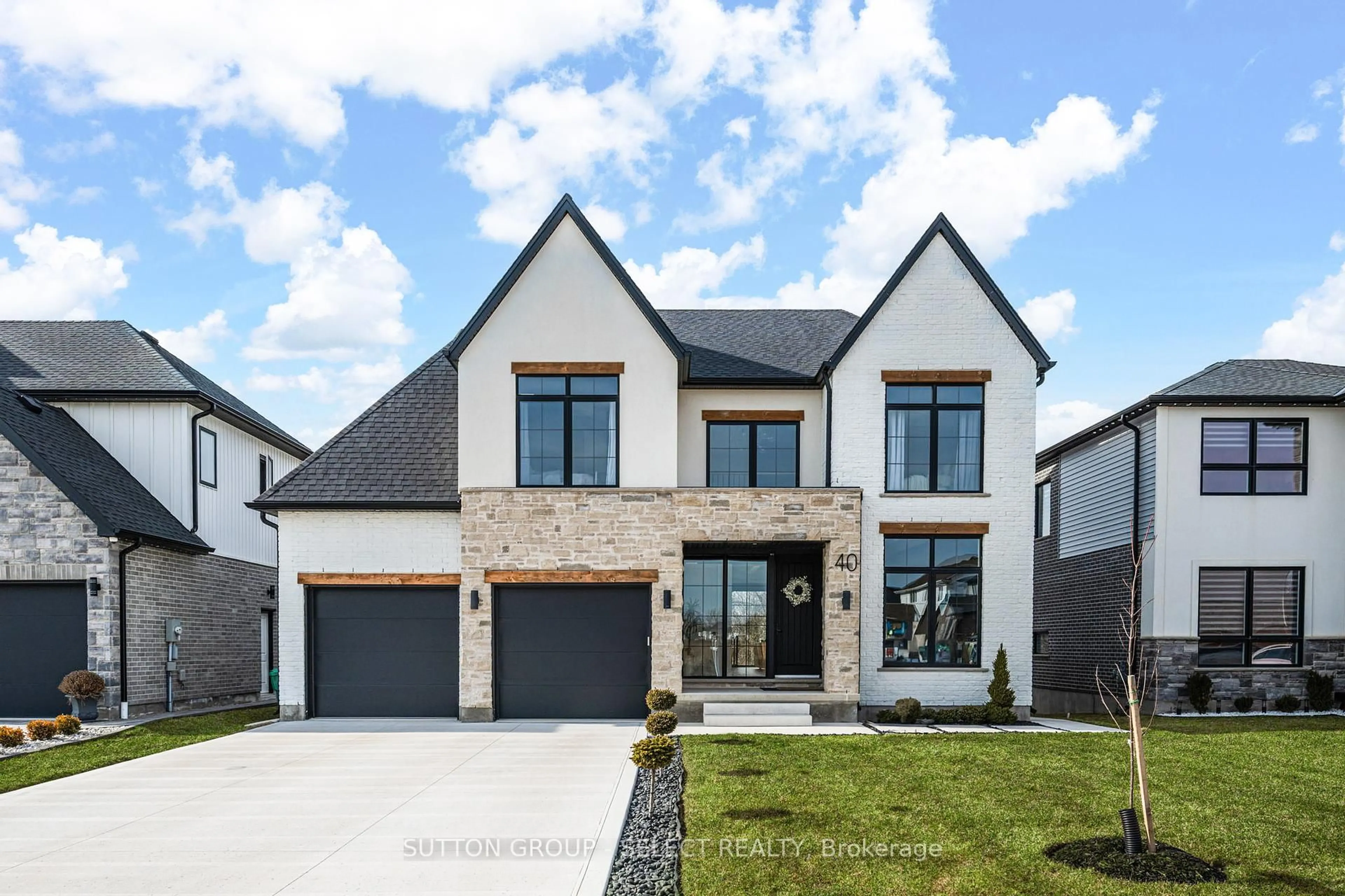 Home with brick exterior material, street for 40 Royal Cres, Southwold Ontario N5P 0G5