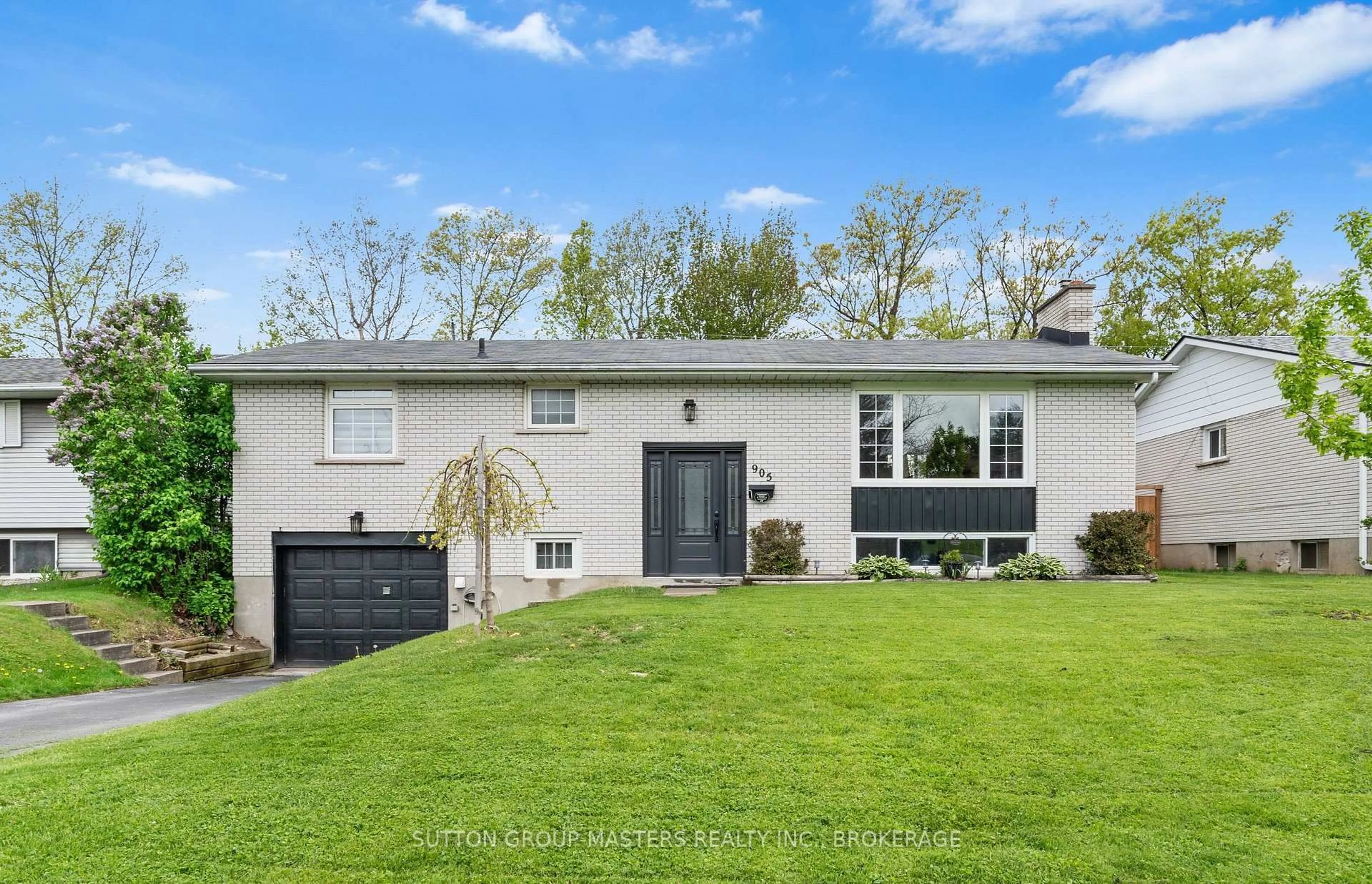 Home with vinyl exterior material, street for 905 Auden Park Dr, Kingston Ontario K7M 4T8