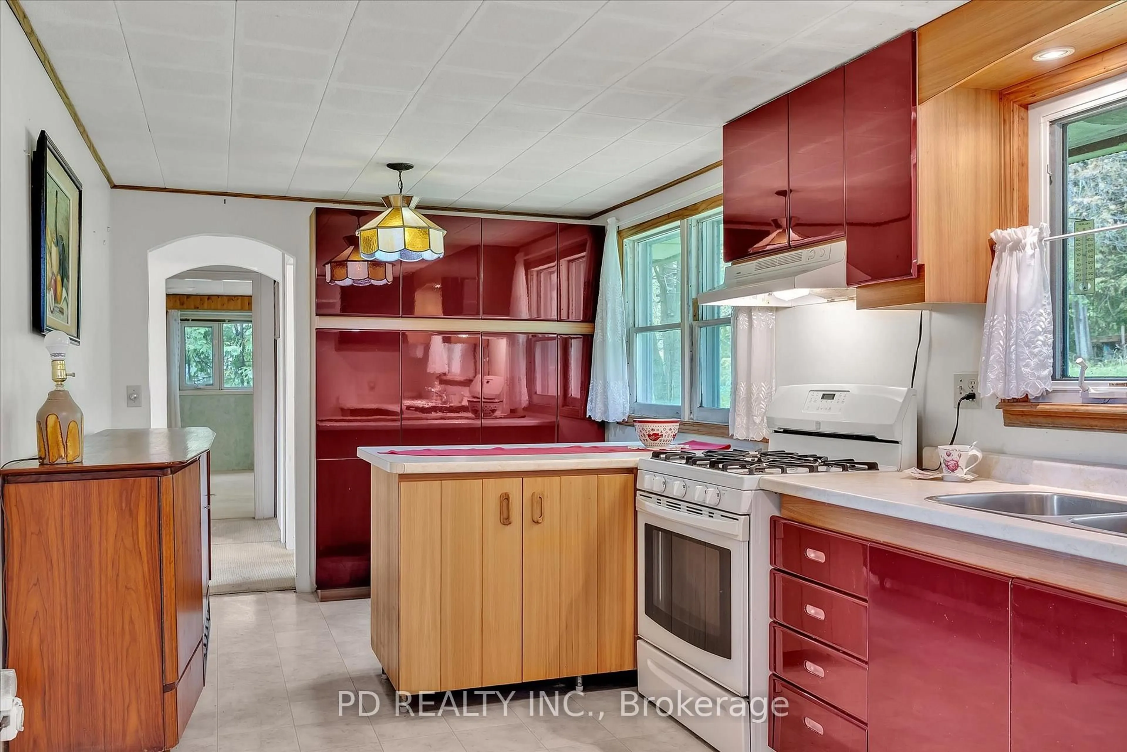 Open concept kitchen, ceramic/tile floor for 22 Evergreen St, Kawartha Lakes Ontario K0L 2W0