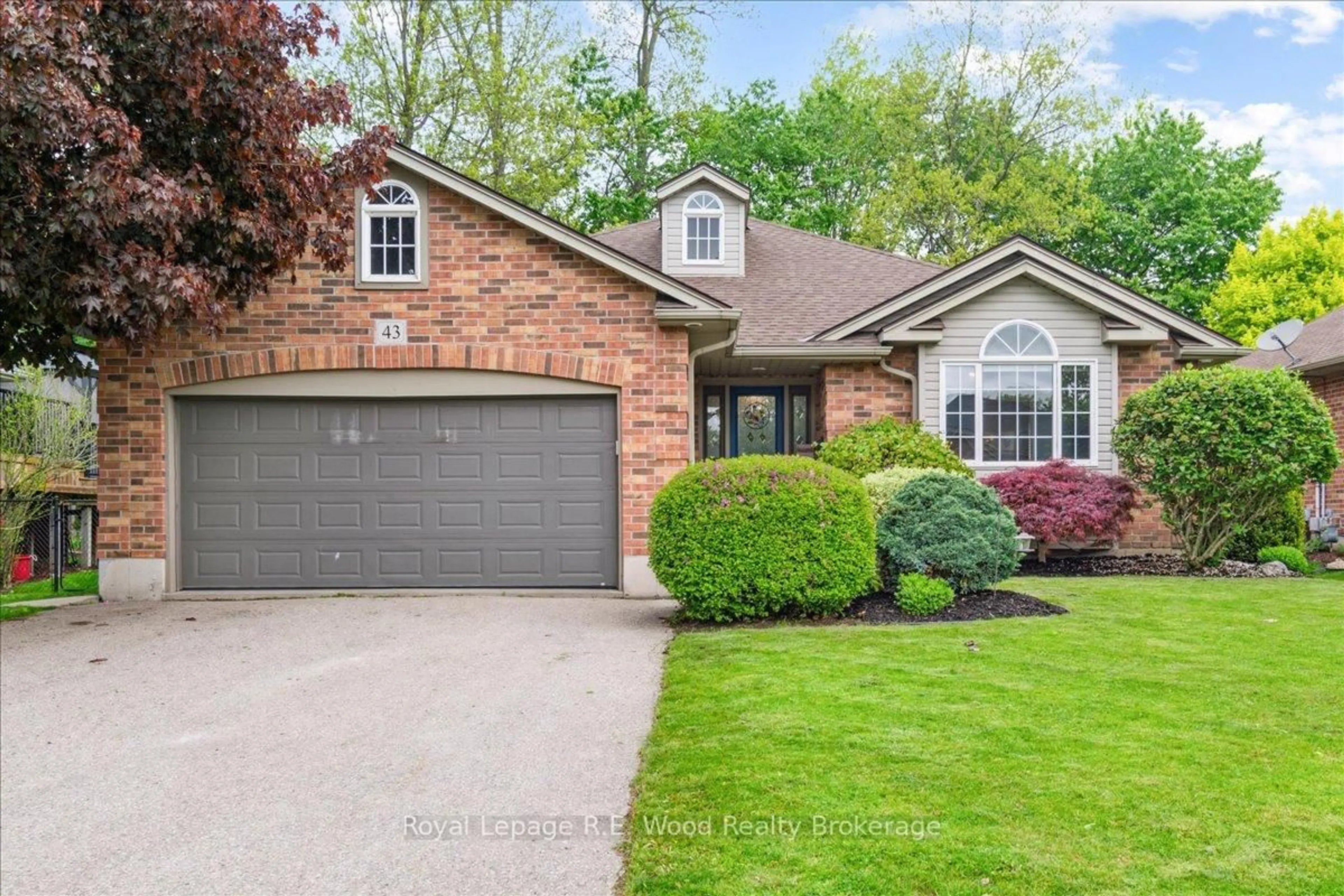 Home with brick exterior material, street for 43 WOODLAND Cres, Tillsonburg Ontario N4G 4G6