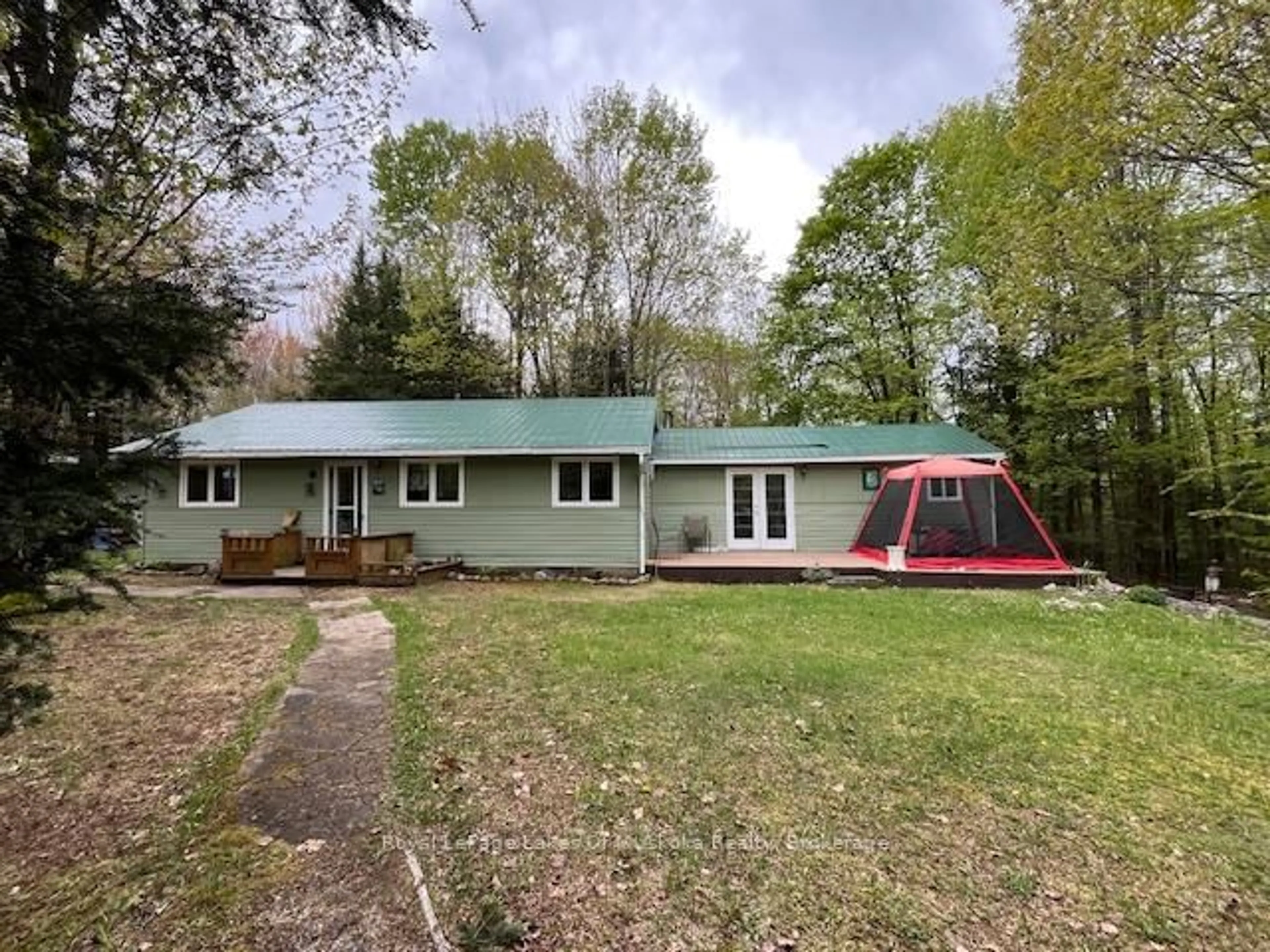A pic from outside/outdoor area/front of a property/back of a property/a pic from drone, street for 668 Hamilton Lake Rd, South River Ontario P0A 1X0