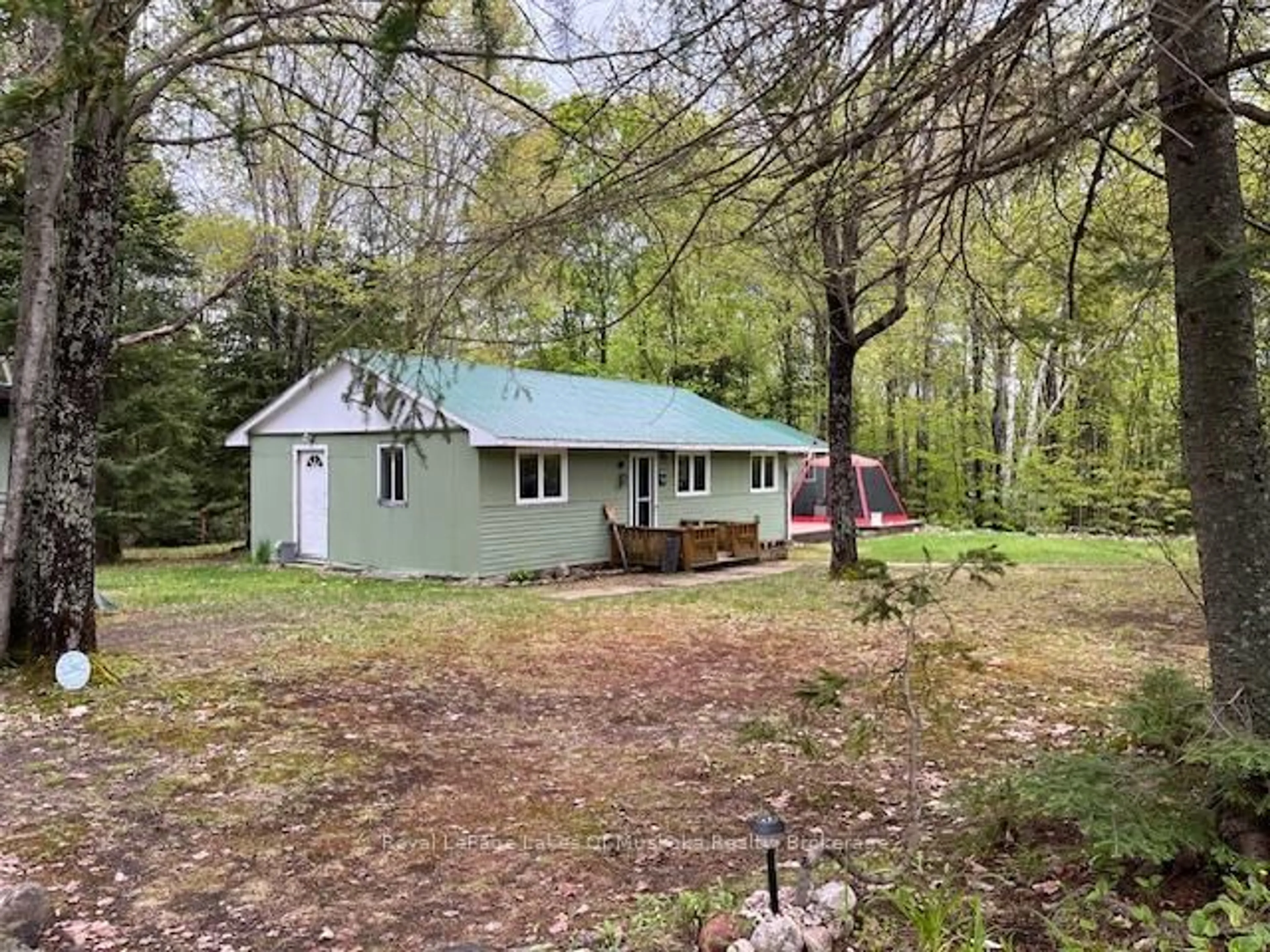 A pic from outside/outdoor area/front of a property/back of a property/a pic from drone, forest/trees view for 668 Hamilton Lake Rd, South River Ontario P0A 1X0