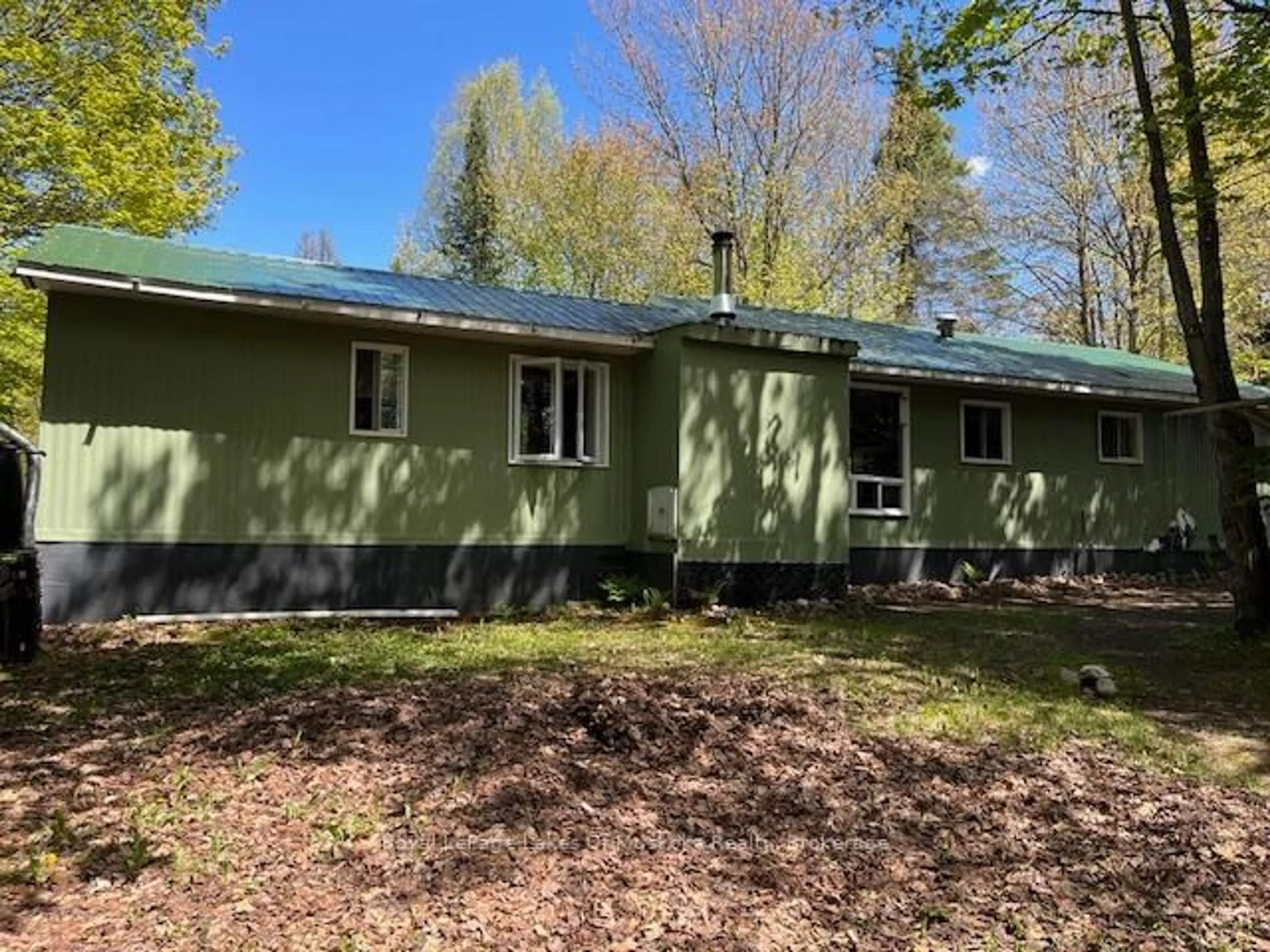 A pic from outside/outdoor area/front of a property/back of a property/a pic from drone, forest/trees view for 668 Hamilton Lake Rd, South River Ontario P0A 1X0