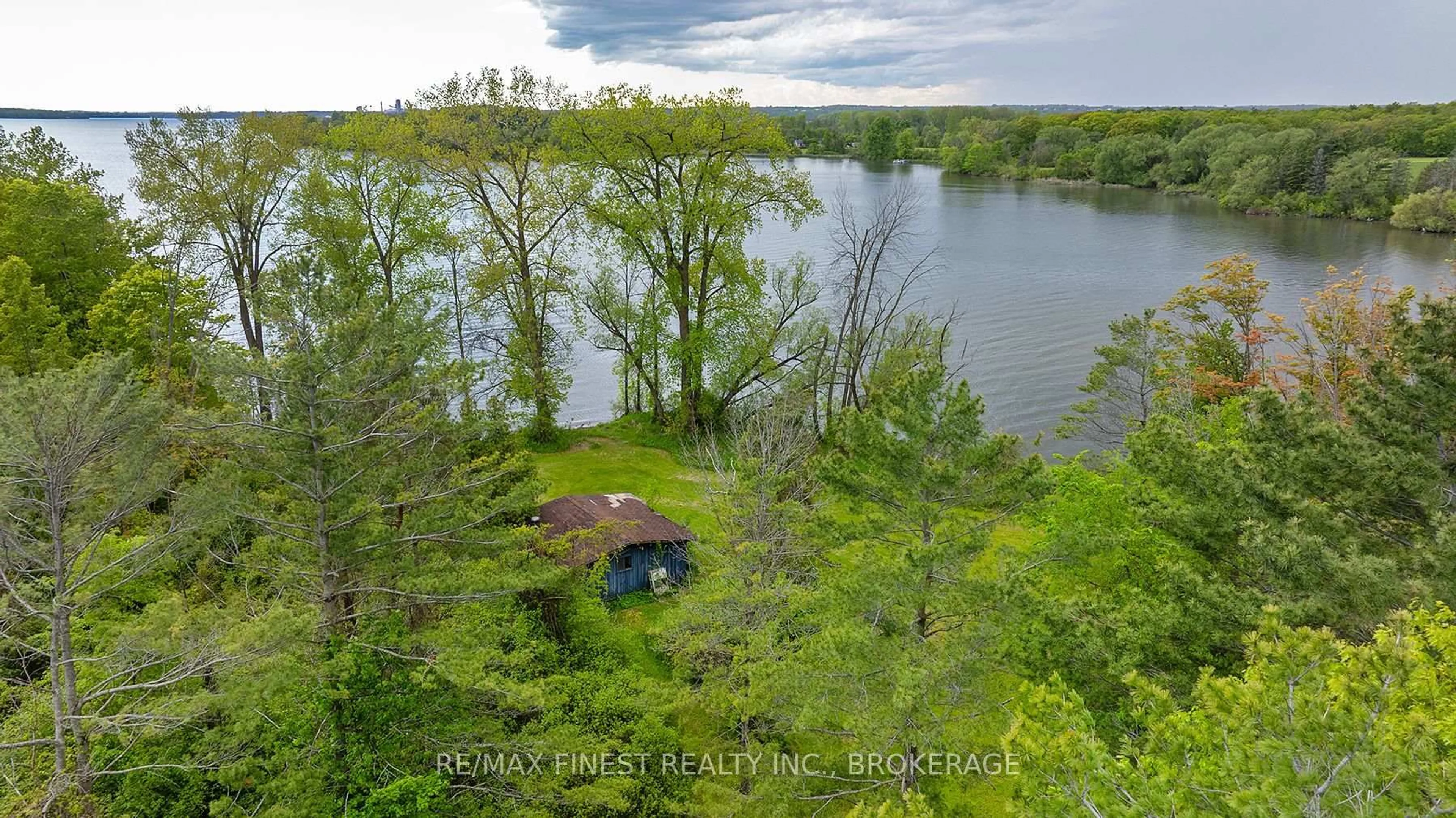 A pic from outside/outdoor area/front of a property/back of a property/a pic from drone, water/lake/river/ocean view for 212 Perch Cove Lane, Napanee Ontario K7R 3K7