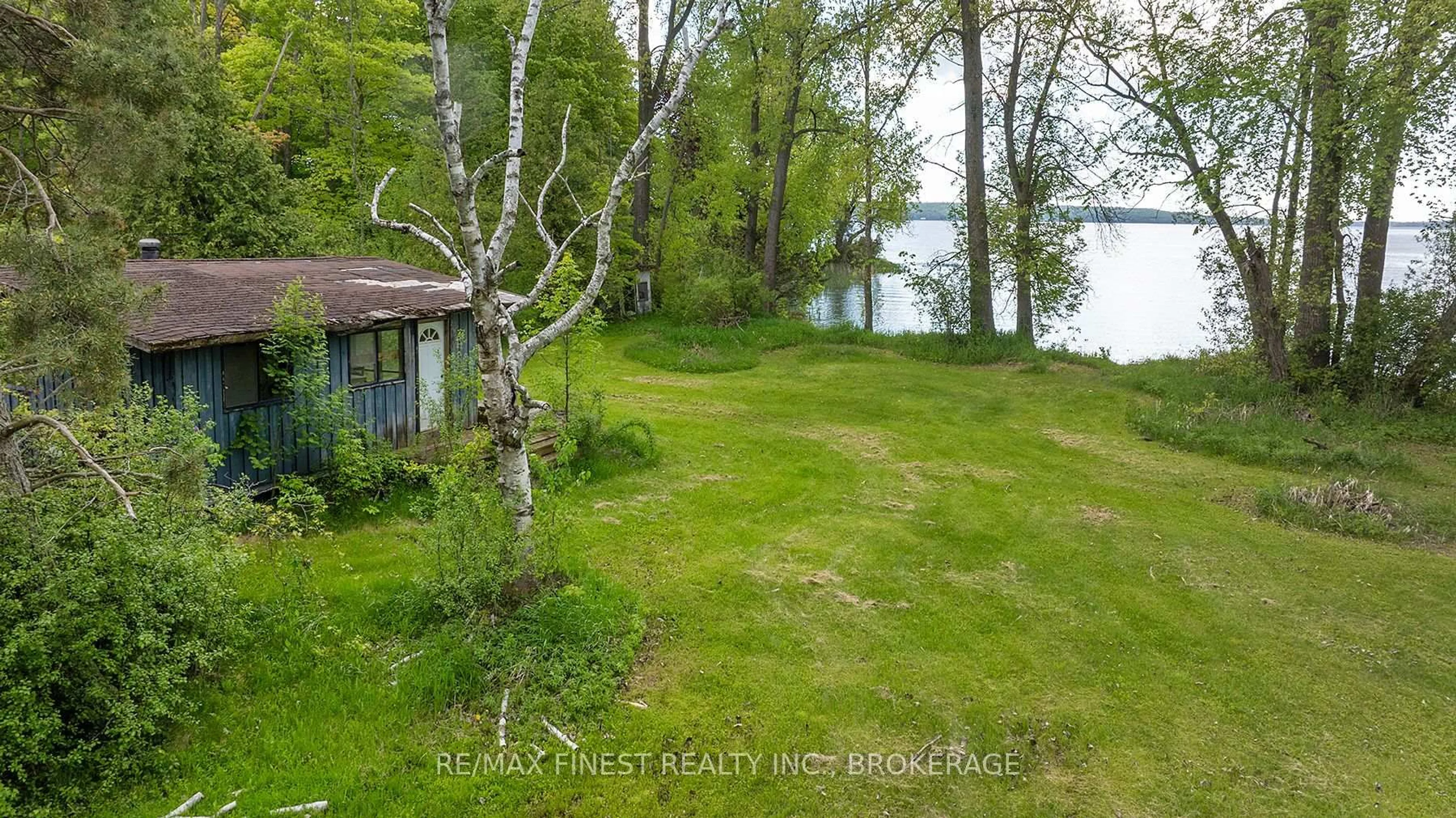 A pic from outside/outdoor area/front of a property/back of a property/a pic from drone, water/lake/river/ocean view for 212 Perch Cove Lane, Napanee Ontario K7R 3K7