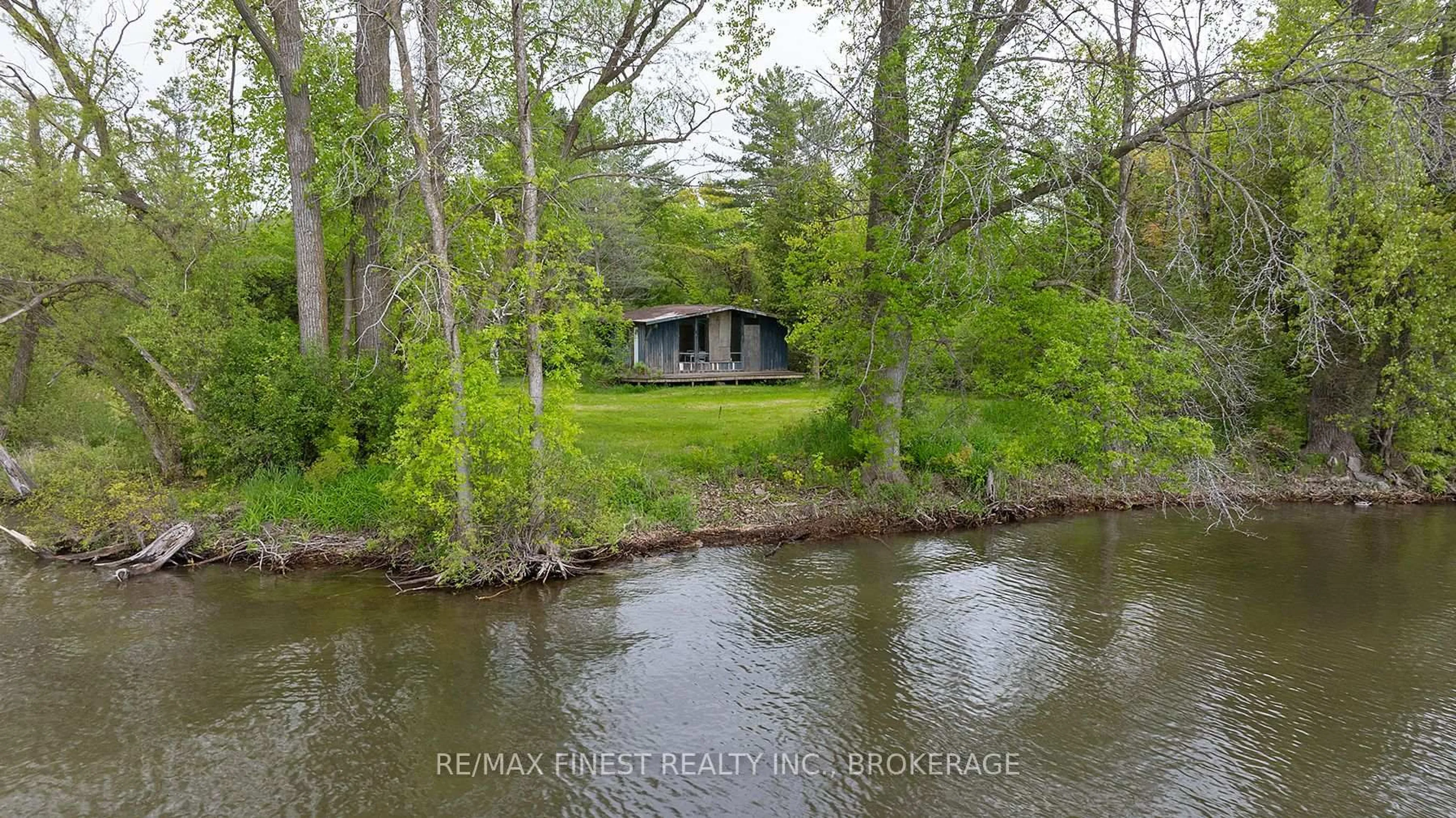 A pic from outside/outdoor area/front of a property/back of a property/a pic from drone, water/lake/river/ocean view for 212 Perch Cove Lane, Napanee Ontario K7R 3K7