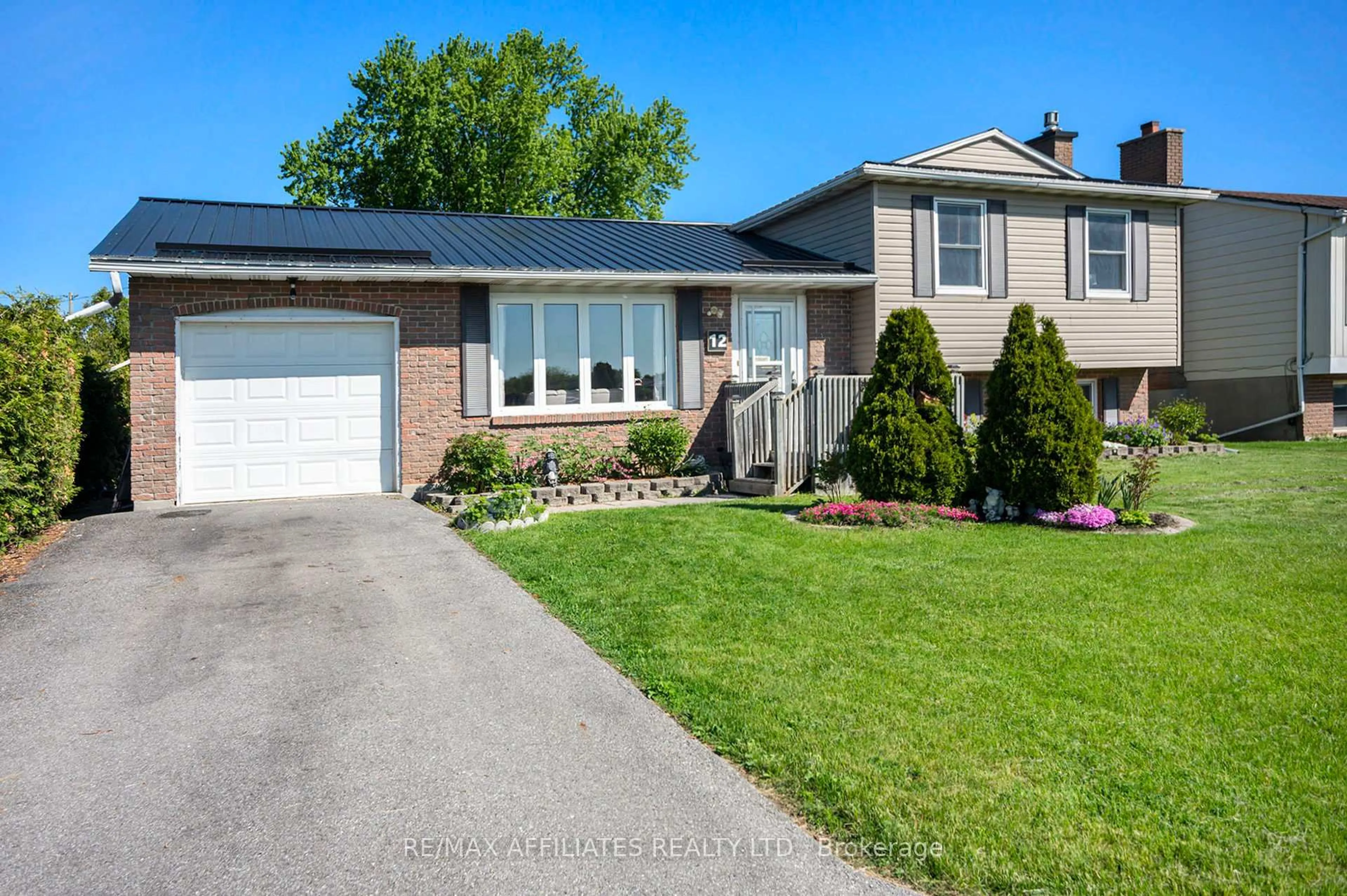 Home with vinyl exterior material, street for 12 Ross St, Smiths Falls Ontario K7A 4V6