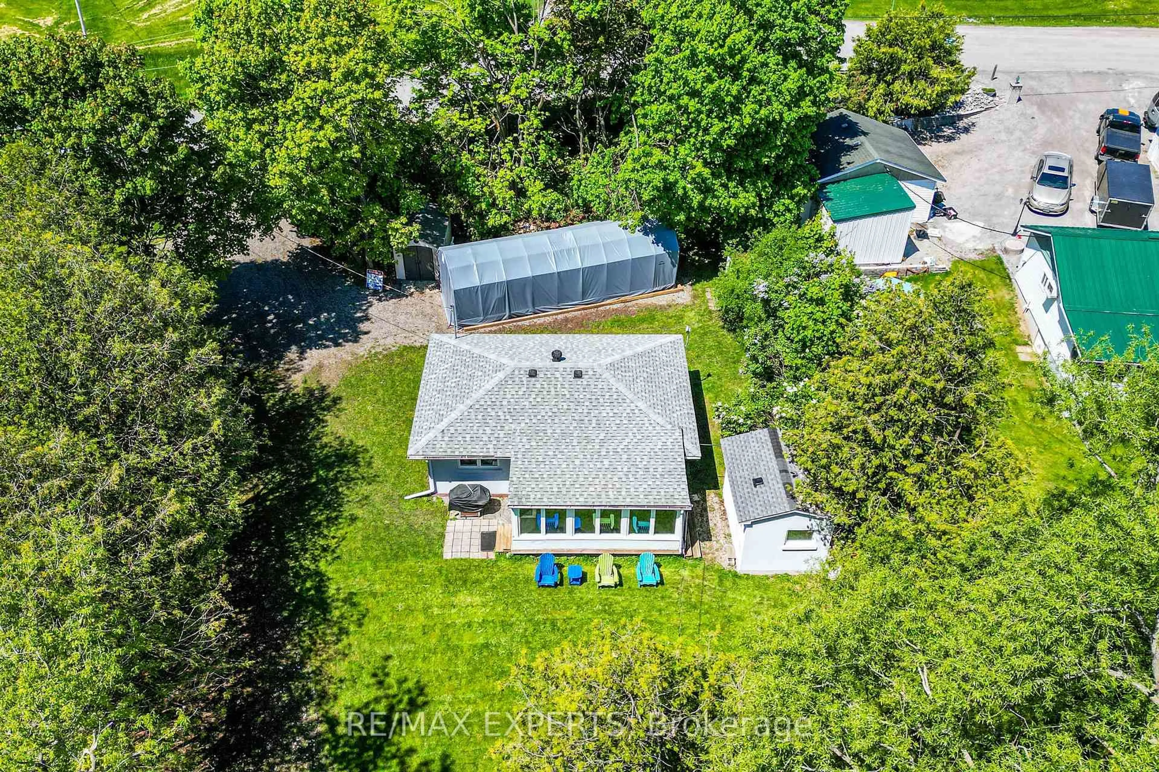 A pic from outside/outdoor area/front of a property/back of a property/a pic from drone, water/lake/river/ocean view for 24 Riverside Dr, Kawartha Lakes Ontario K9V 0H6