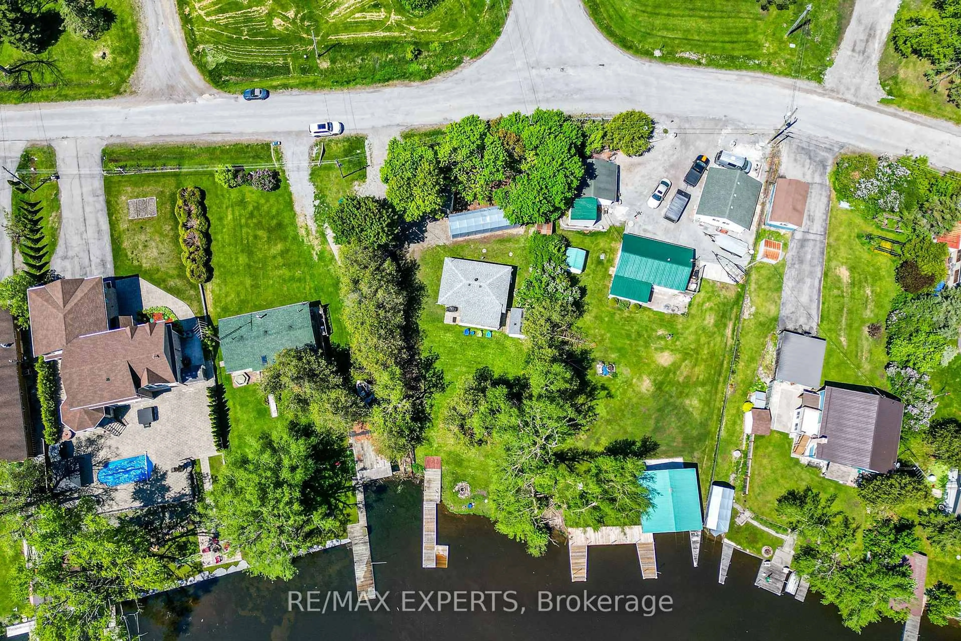 A pic from outside/outdoor area/front of a property/back of a property/a pic from drone, water/lake/river/ocean view for 24 Riverside Dr, Kawartha Lakes Ontario K9V 0H6