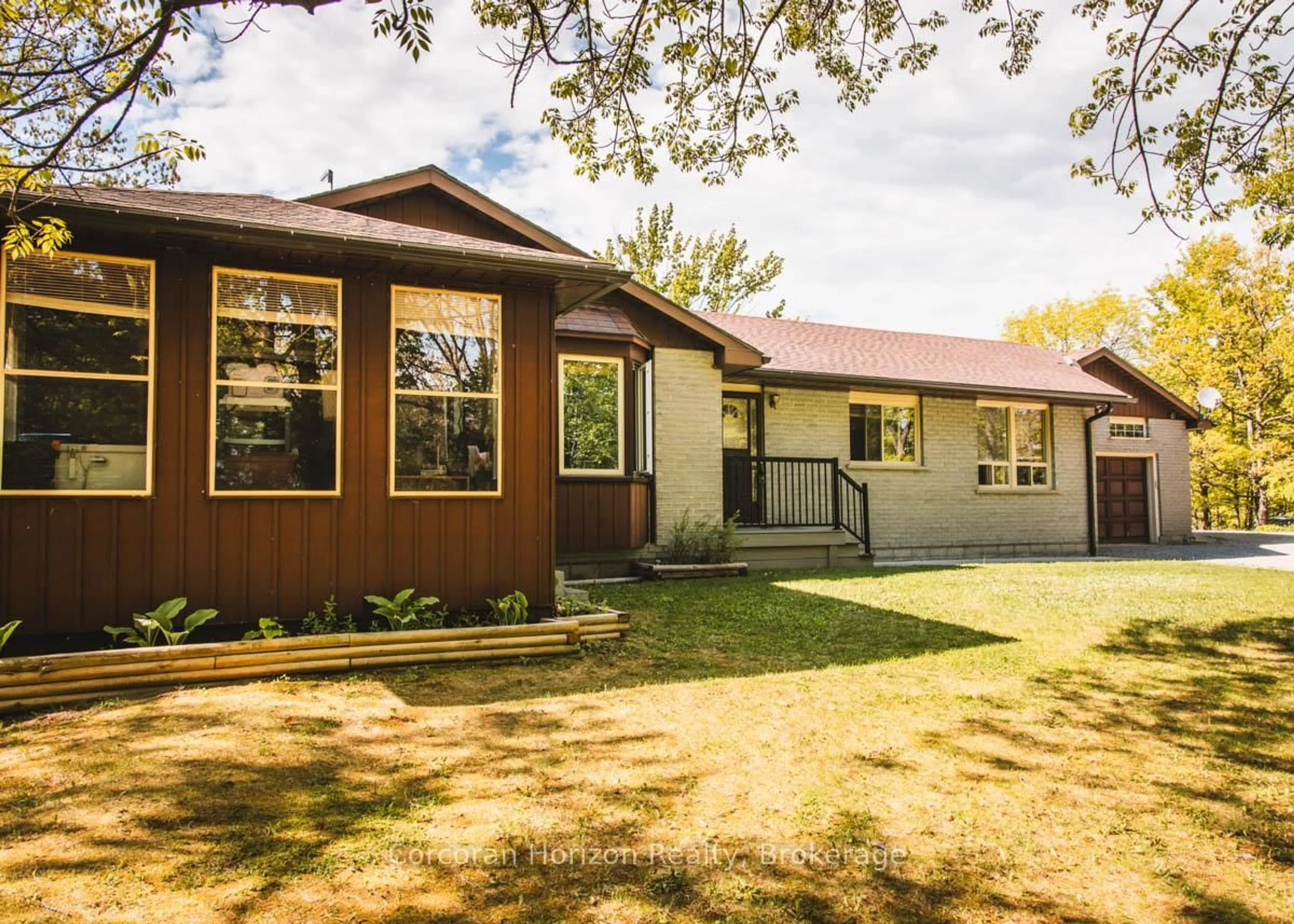 Home with vinyl exterior material, street for 87 CORRIEVALE Rd, Georgian Bay Ontario L0K 1S0