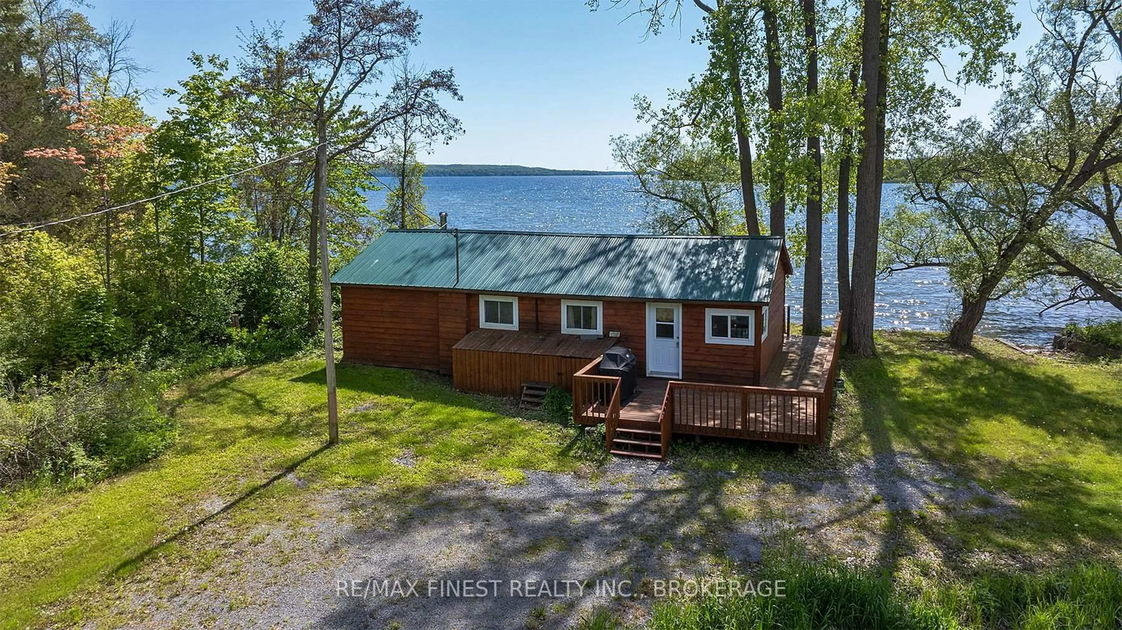 A pic from outside/outdoor area/front of a property/back of a property/a pic from drone, water/lake/river/ocean view for 201 Perch Cove Lane, Napanee Ontario K7R 3K7