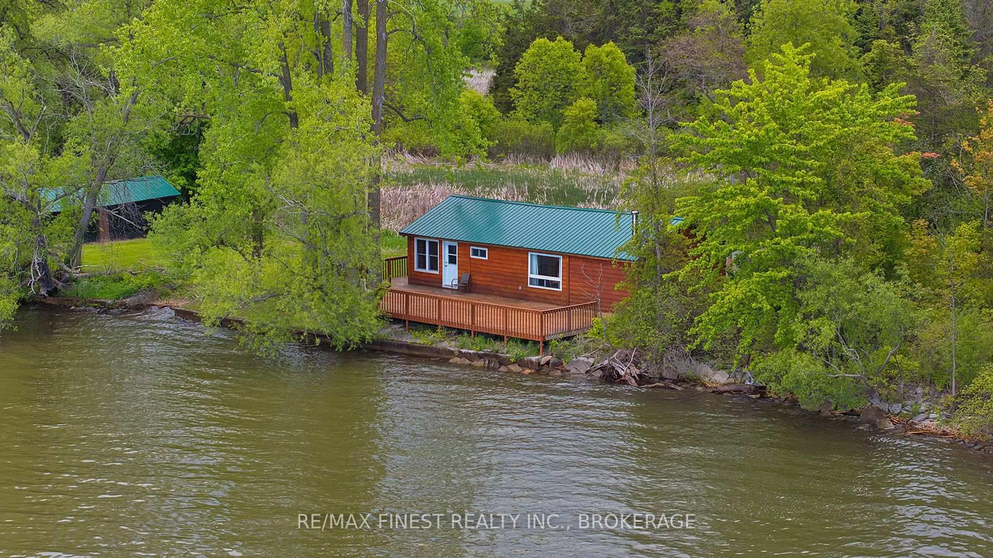 A pic from outside/outdoor area/front of a property/back of a property/a pic from drone, water/lake/river/ocean view for 201 Perch Cove Lane, Napanee Ontario K7R 3K7