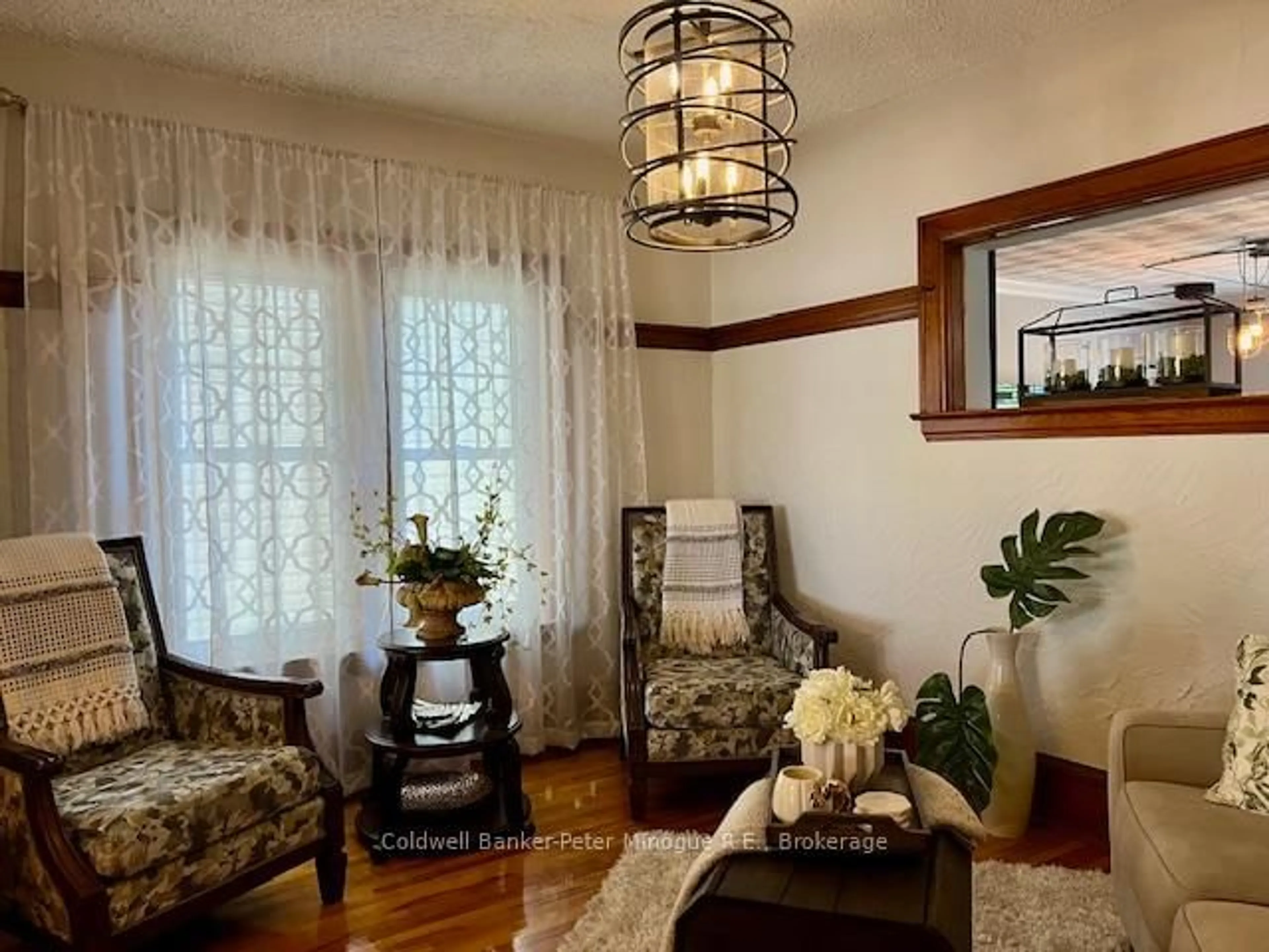 Living room with furniture, wood/laminate floor for 1209 HAMMOND St, North Bay Ontario P1B 2J2